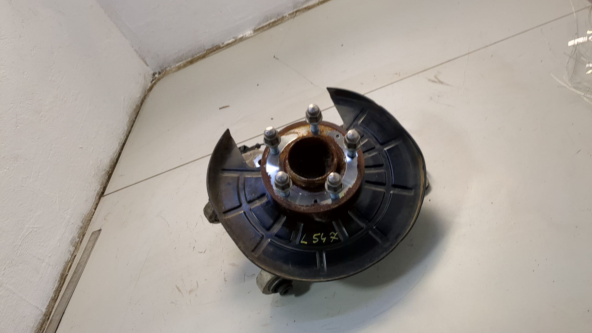 Кулак поворотный задний левый