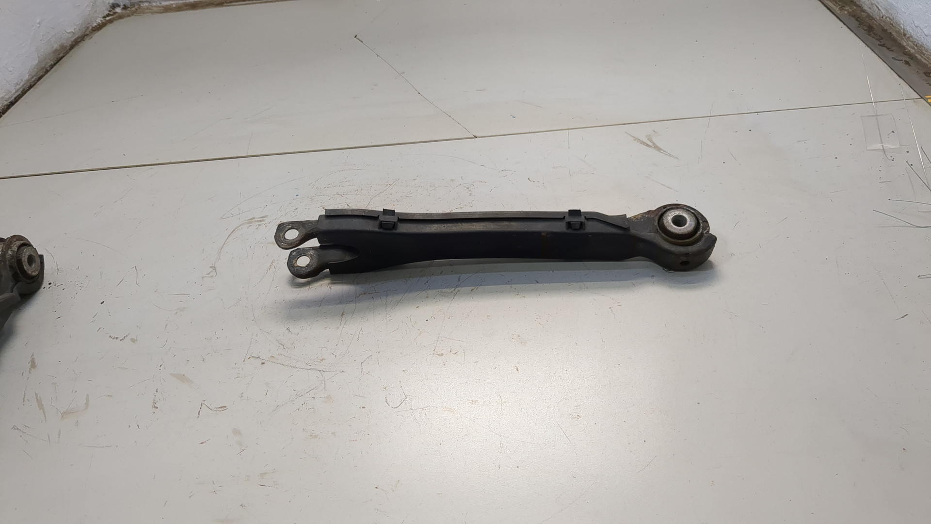 Рычаг задний