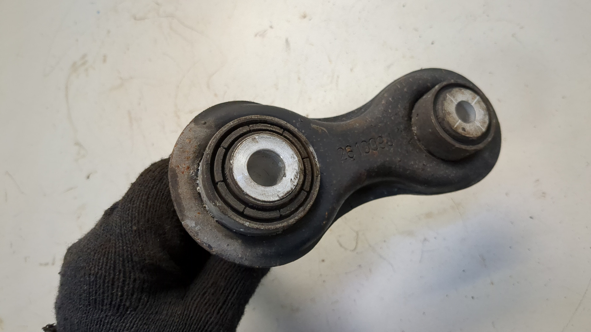 Рычаг задний левый