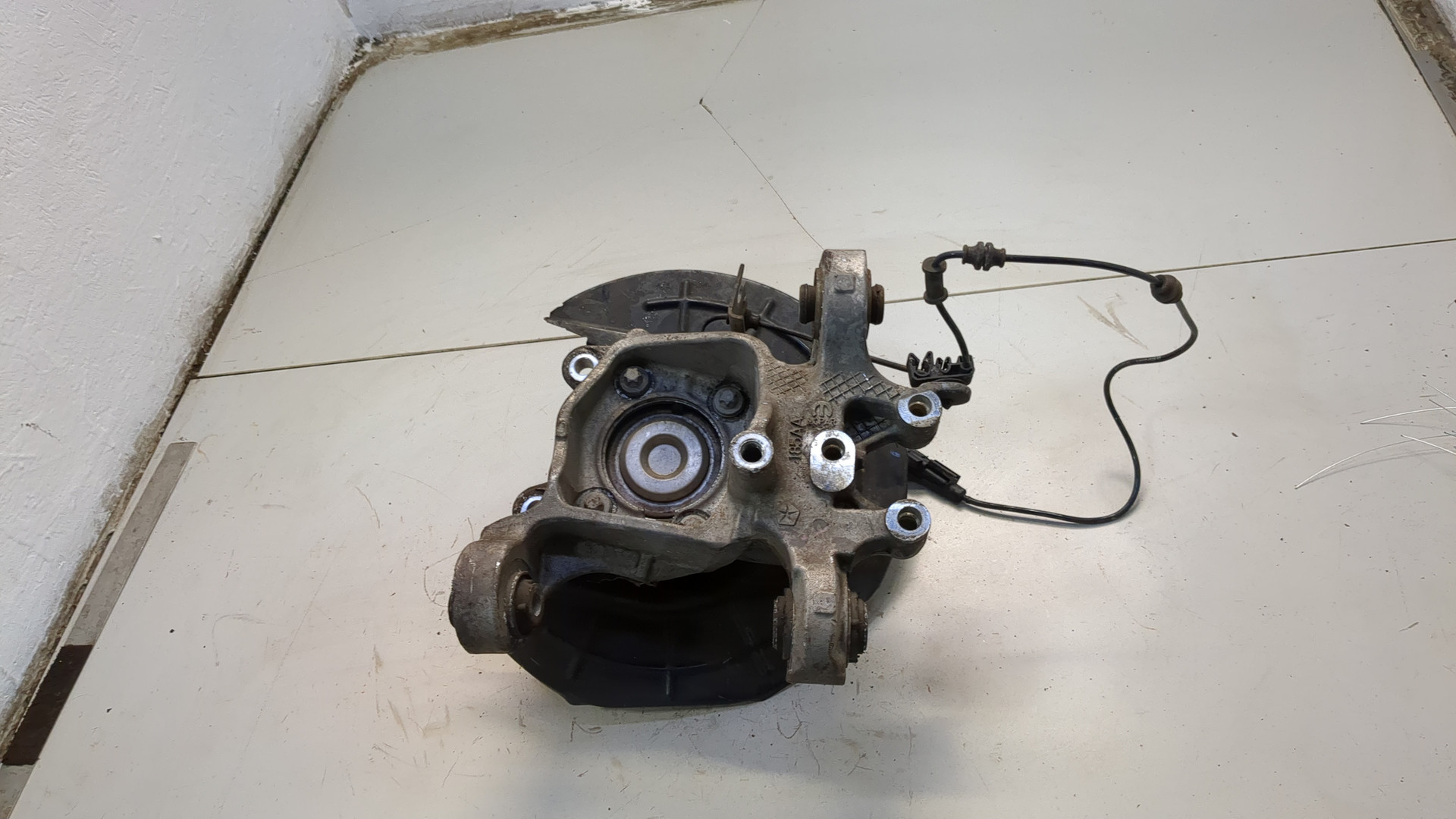 Кулак поворотный задний левый