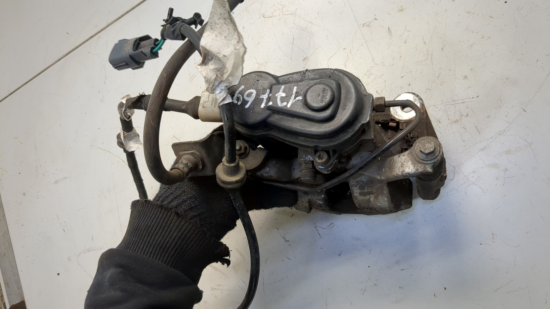 Суппорт задний левый