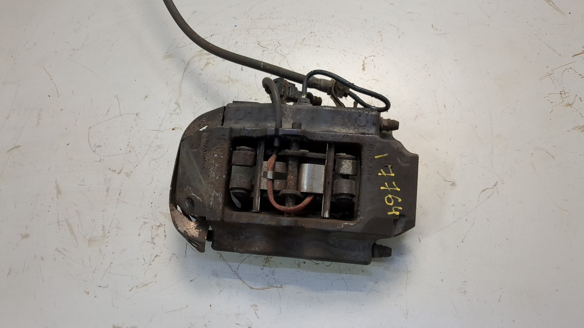 Суппорт задний левый