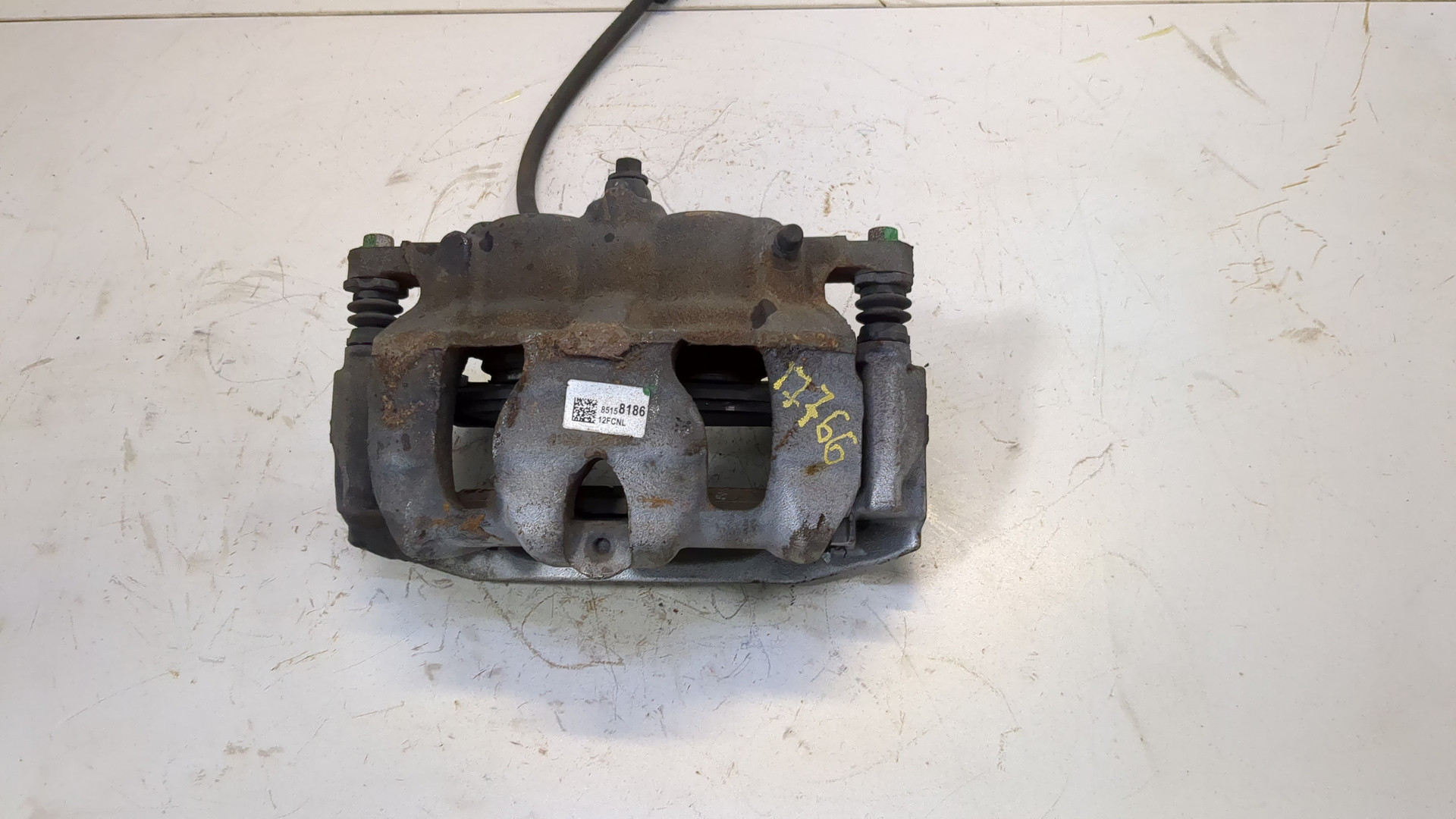 Суппорт передний левый