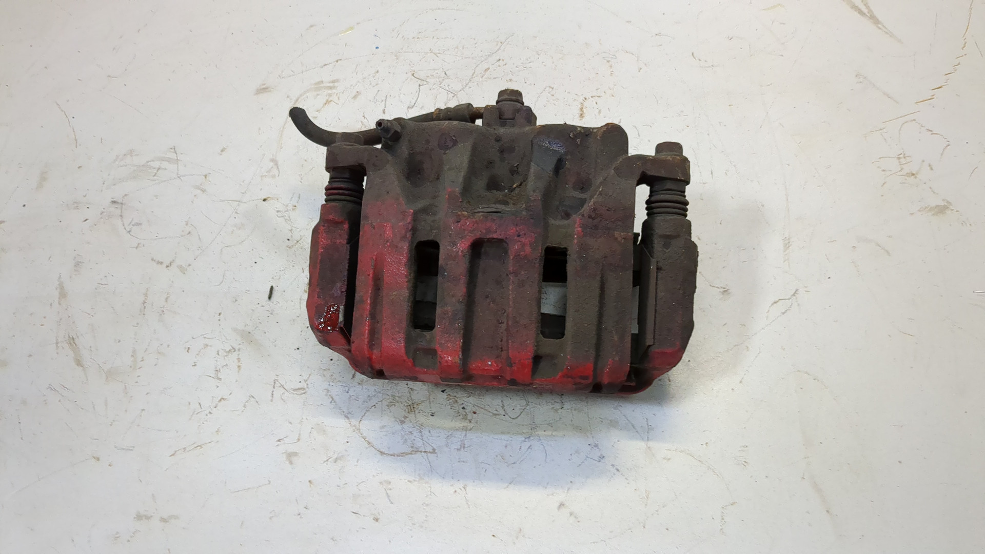 Суппорт передний левый