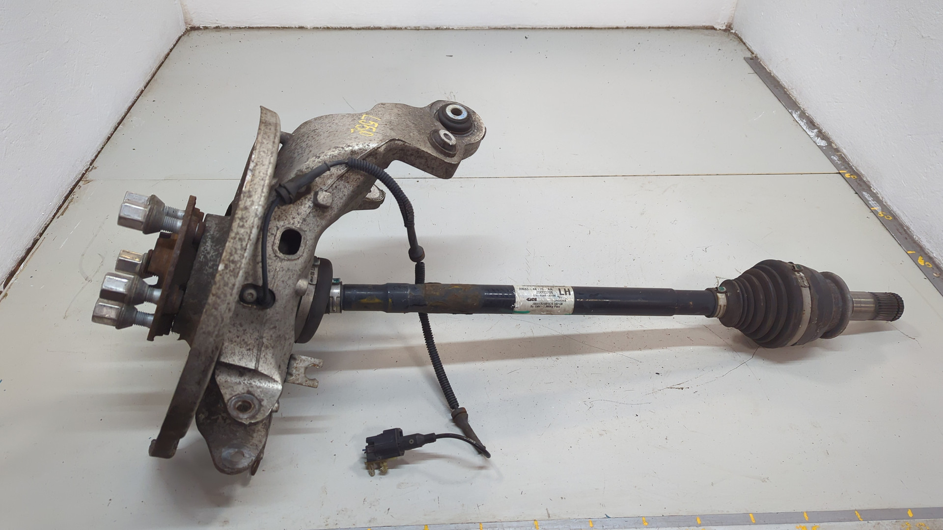 Кулак поворотный задний левый