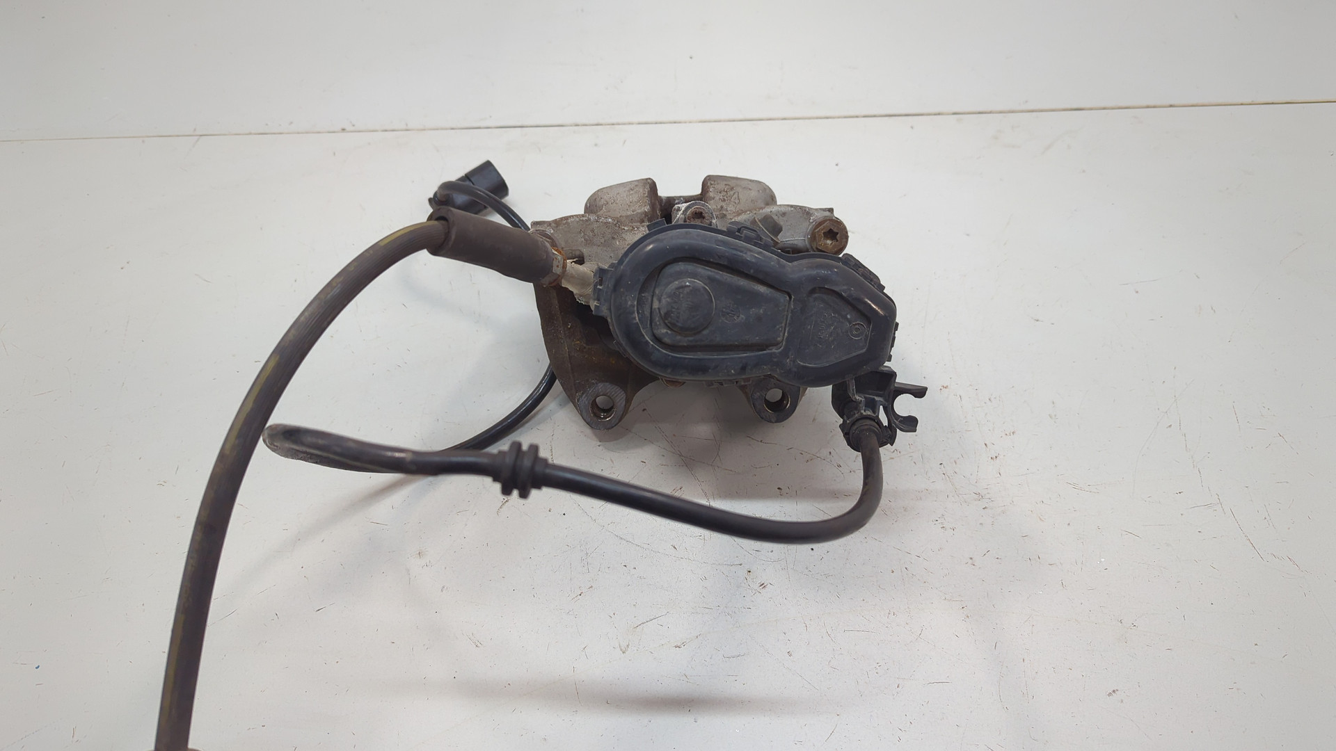 Суппорт задний левый