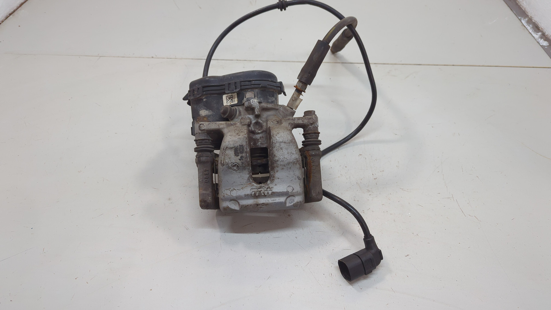 Суппорт задний левый