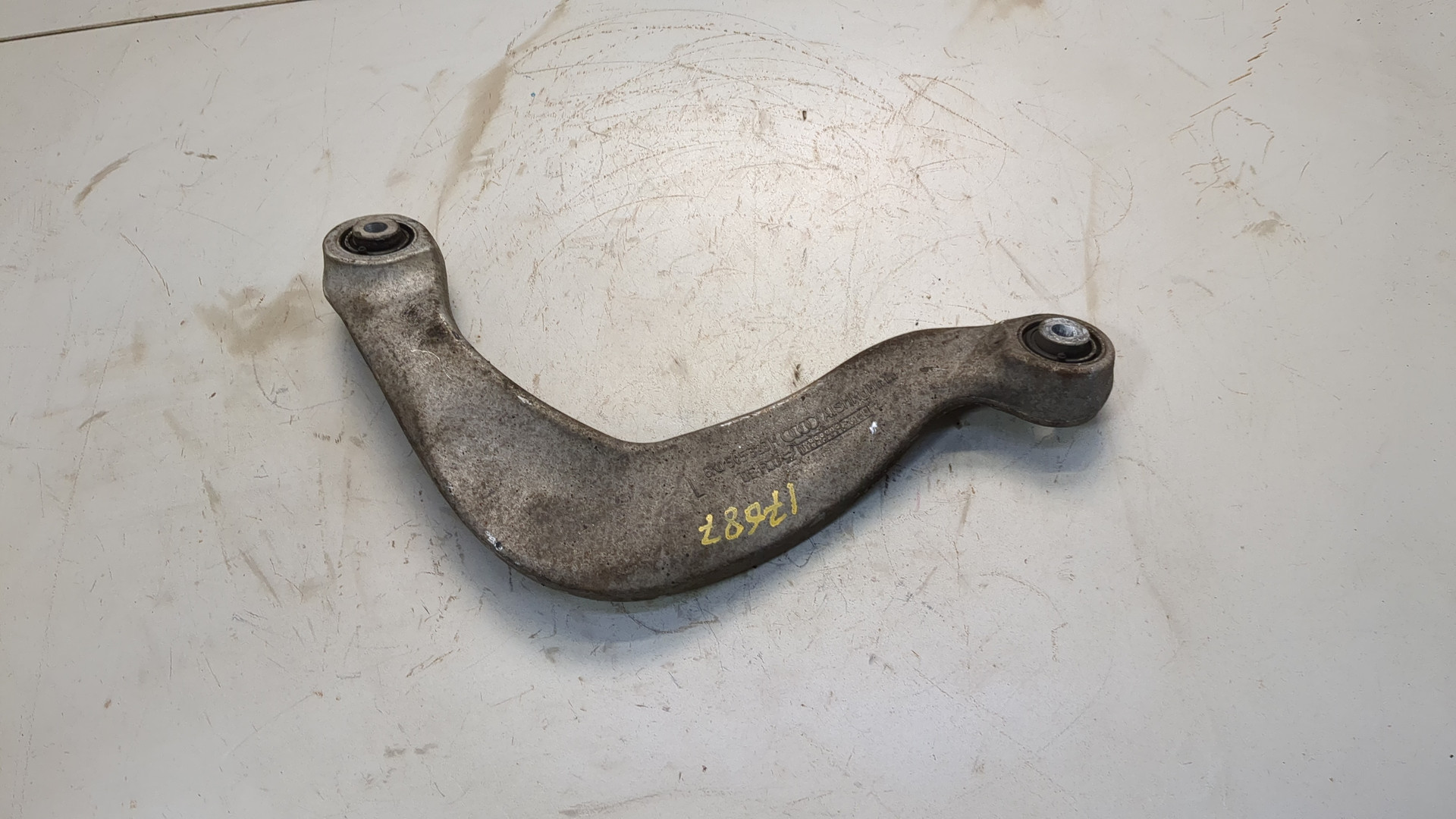 Рычаг задний левый