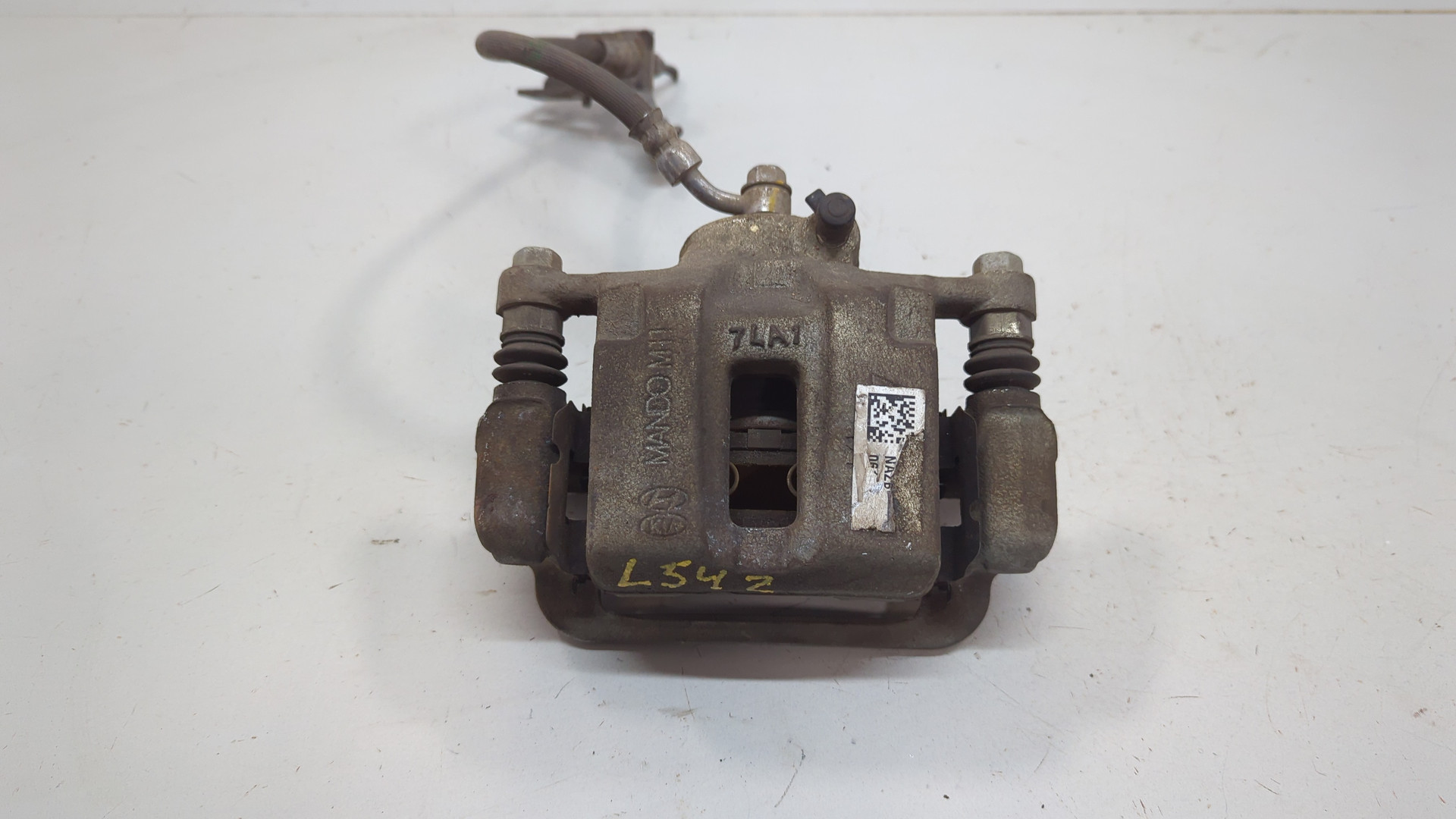 Суппорт задний левый