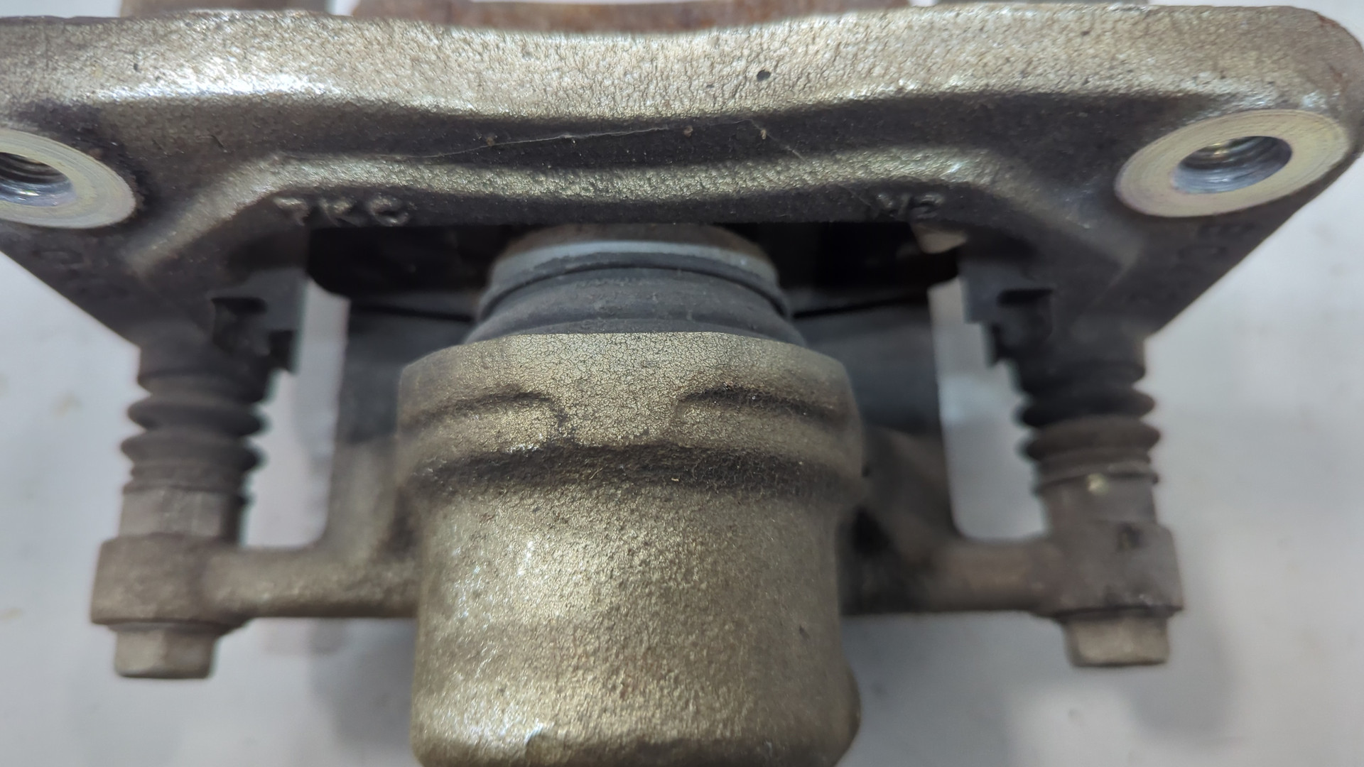 Суппорт задний левый