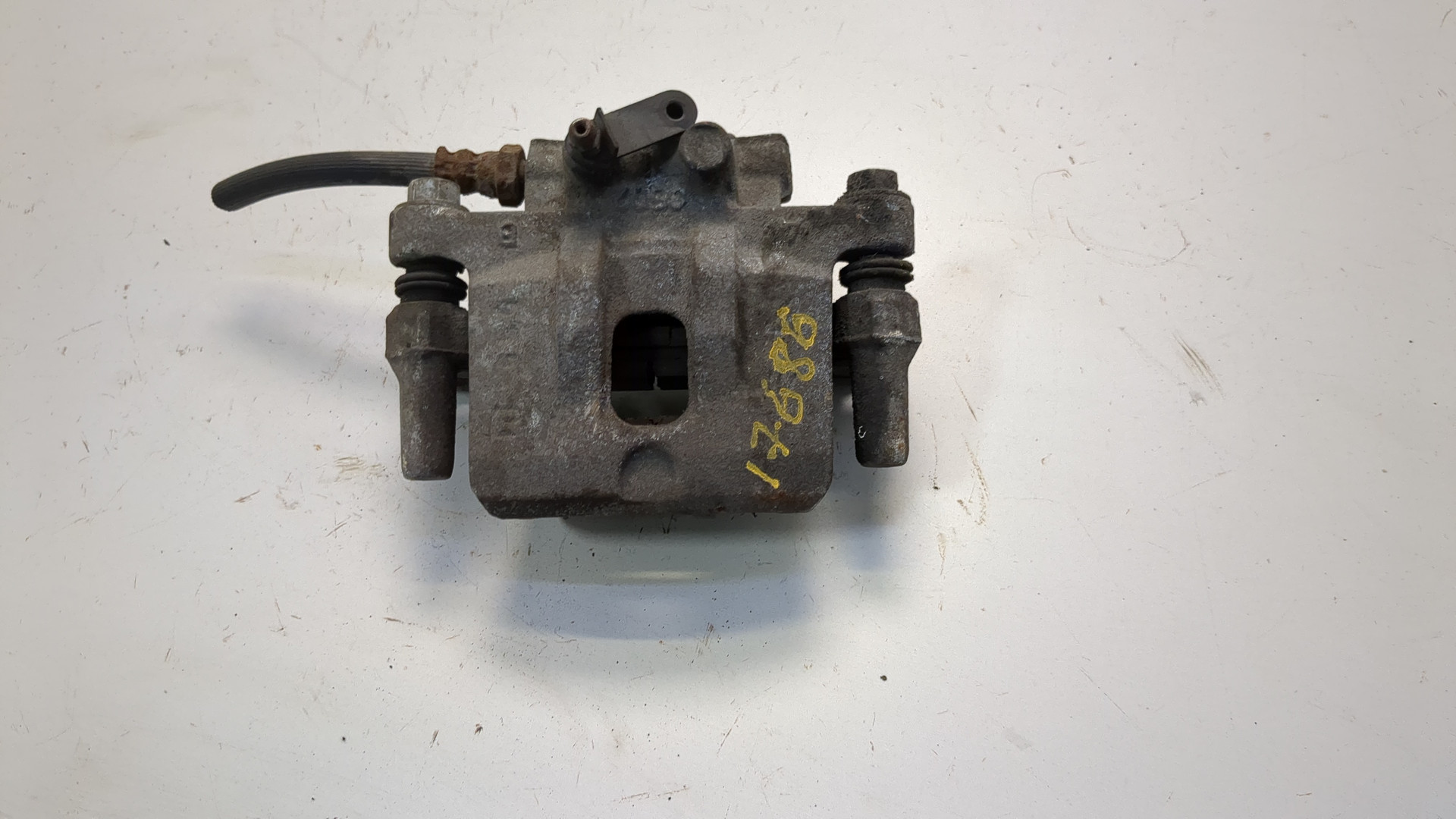 Суппорт задний левый