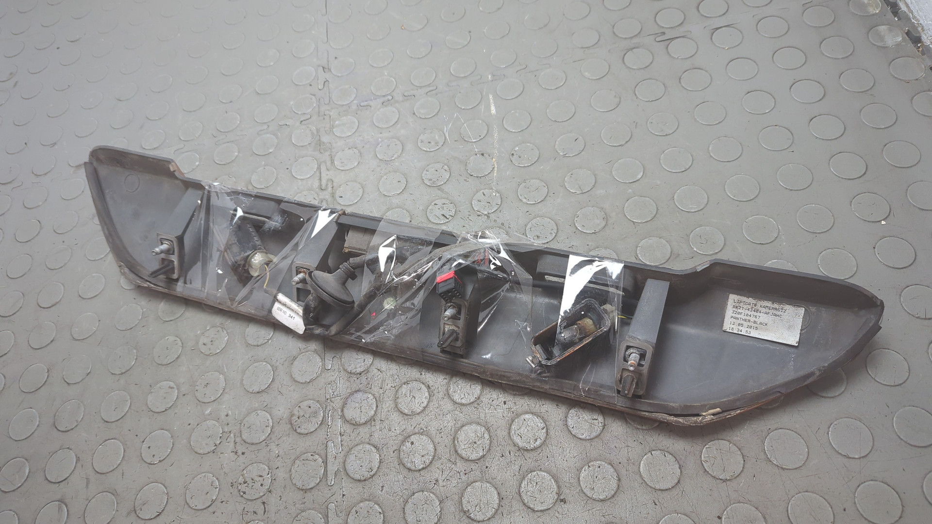 Фонарь подсветки номера