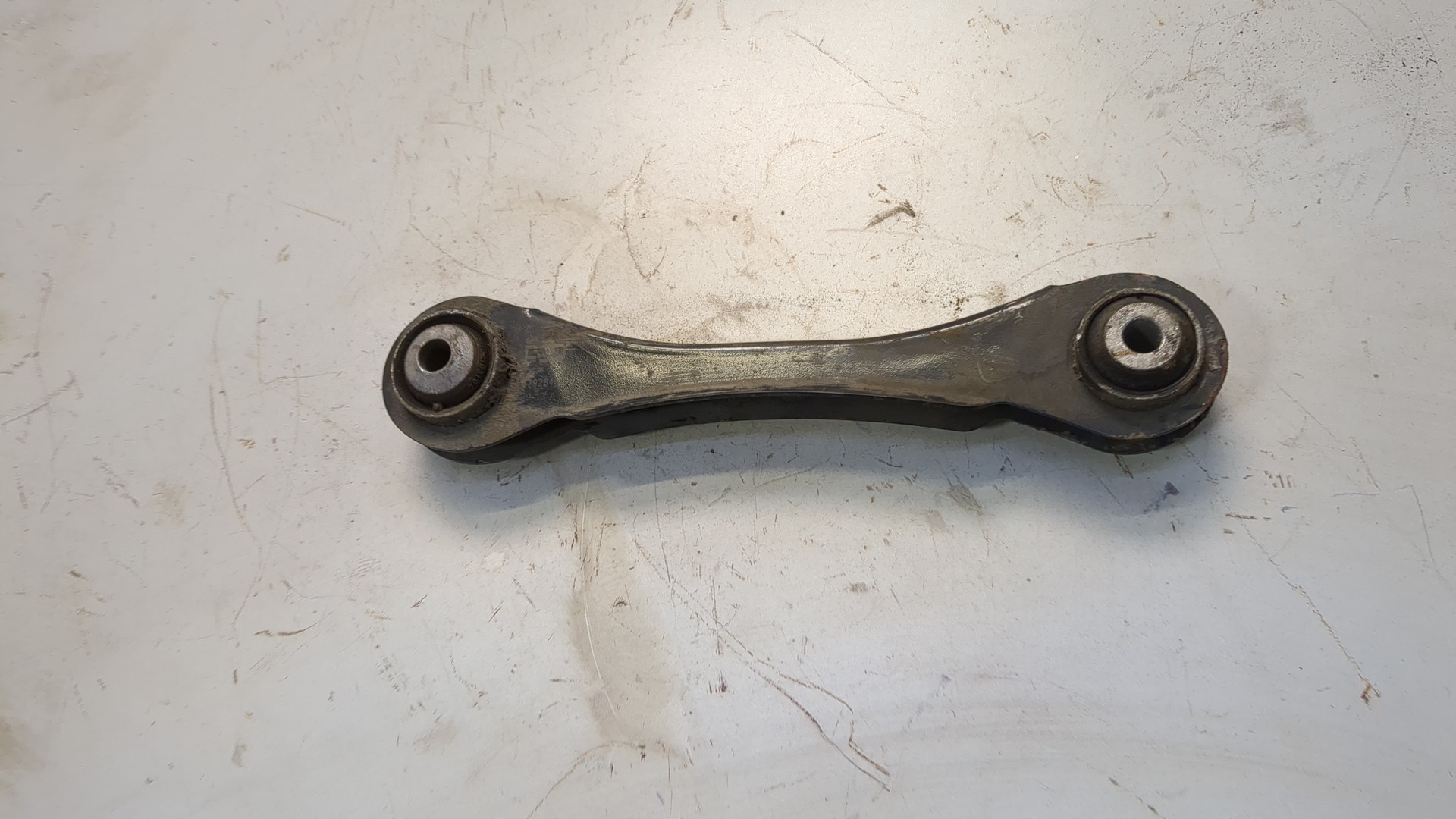 Рычаг задний левый