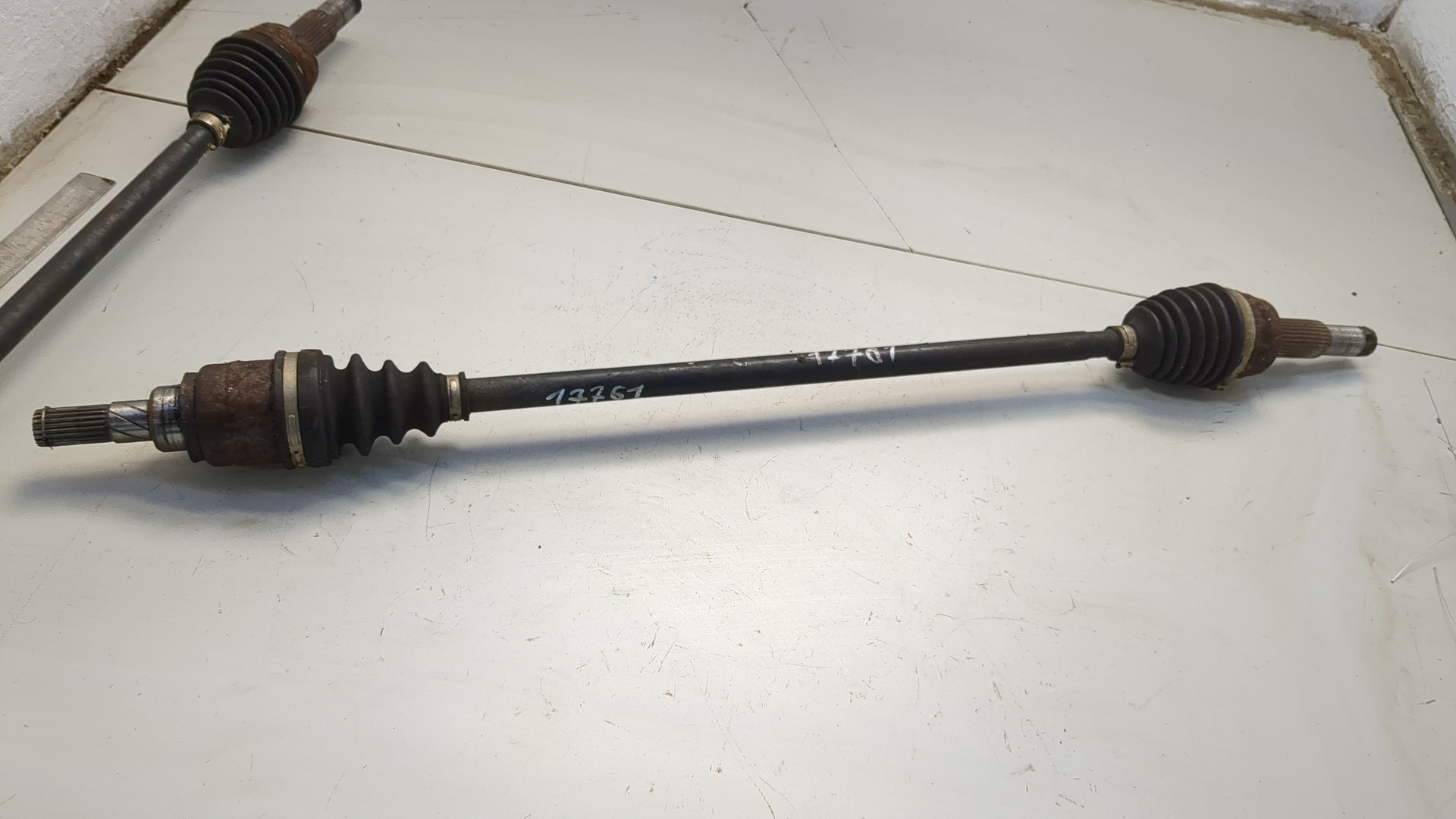 Полуось задняя