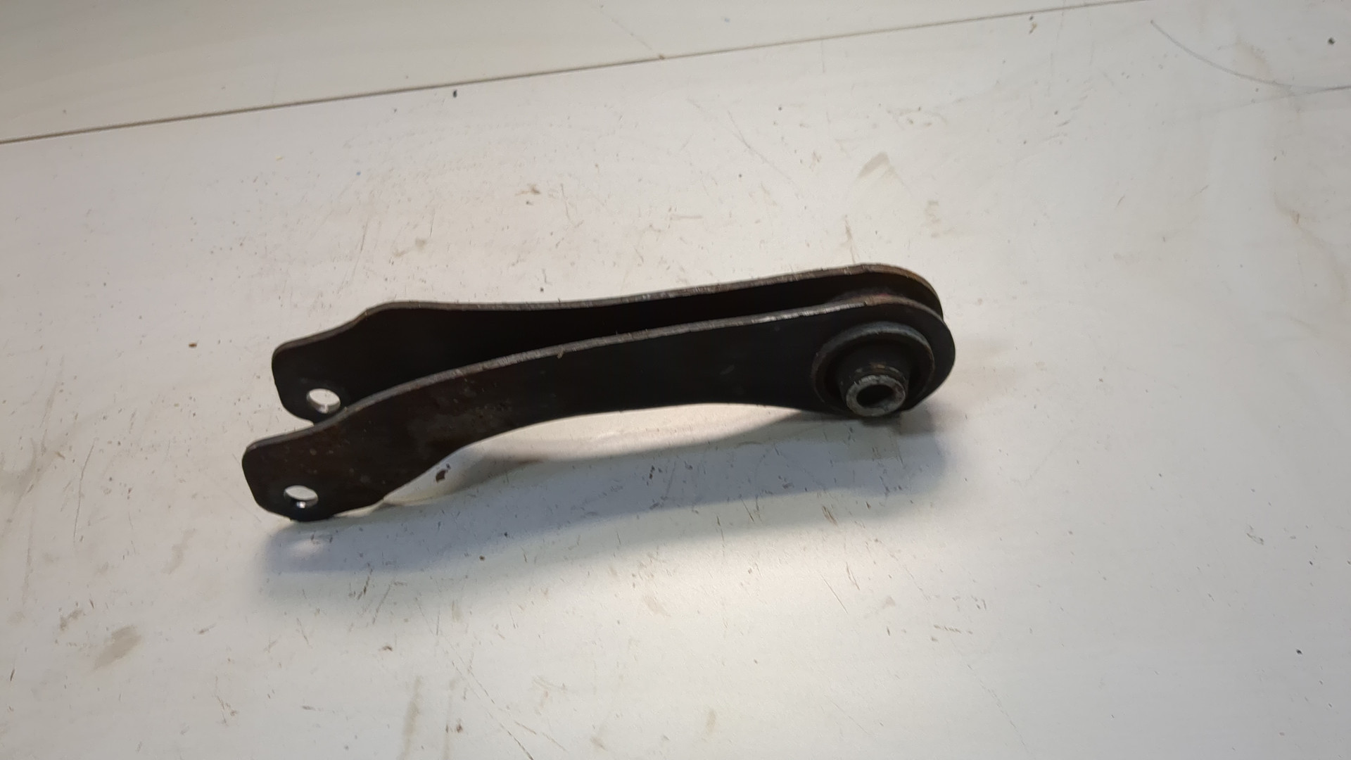 Рычаг задний