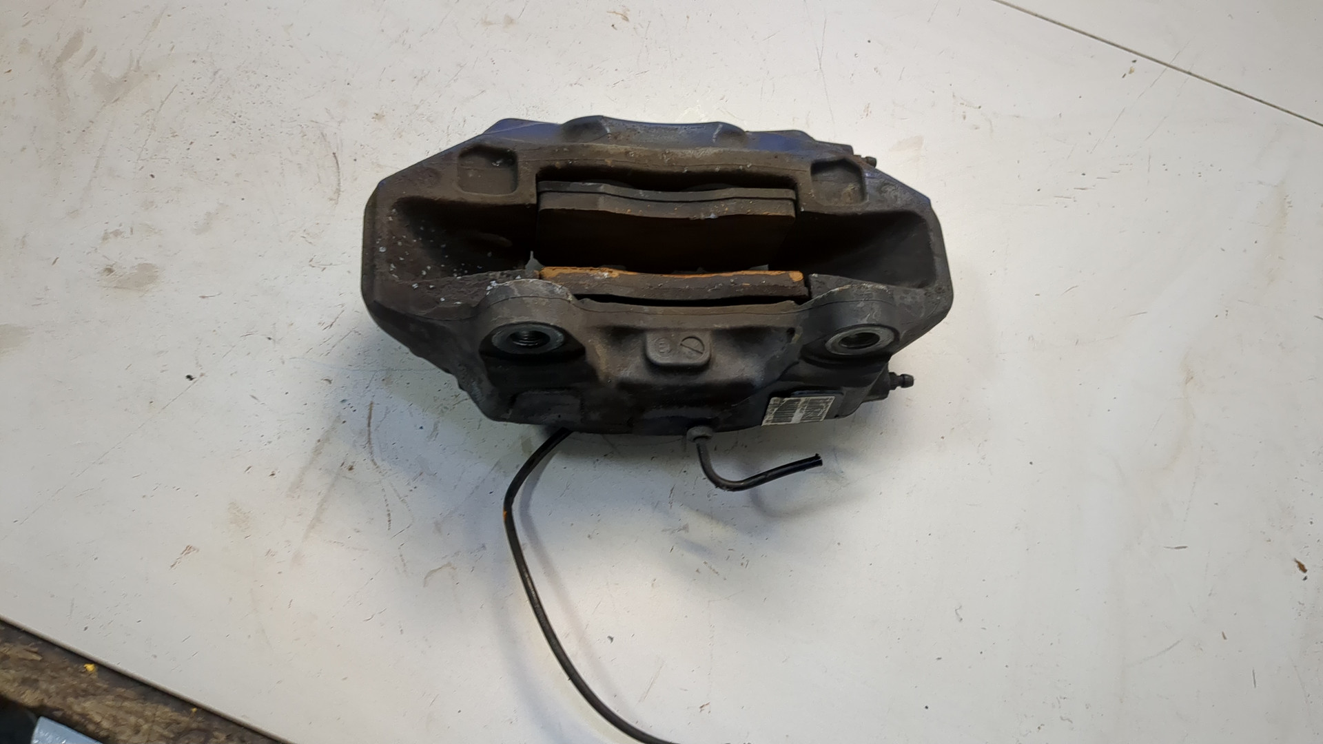 Суппорт передний левый