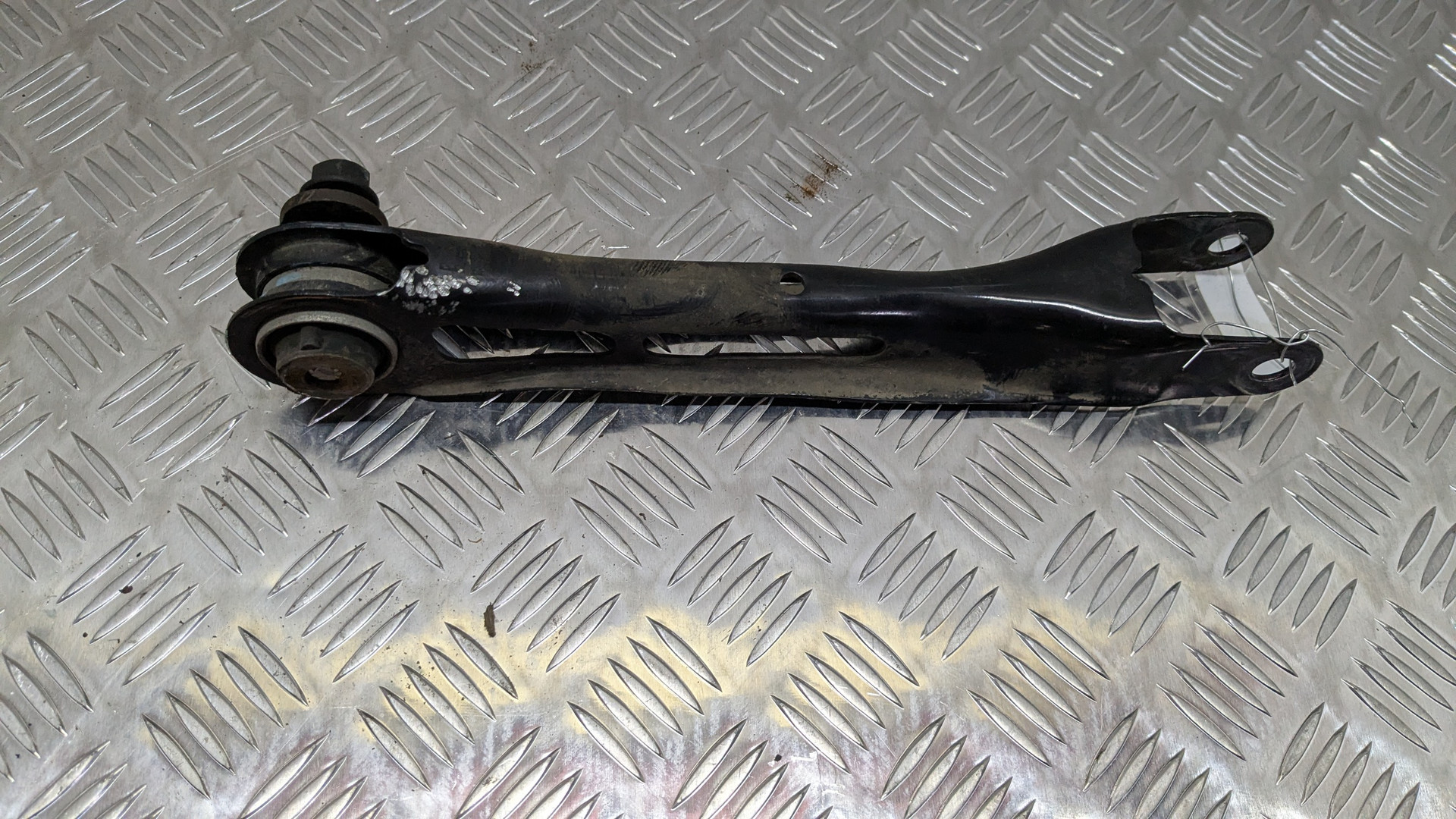 Рычаг задний правый