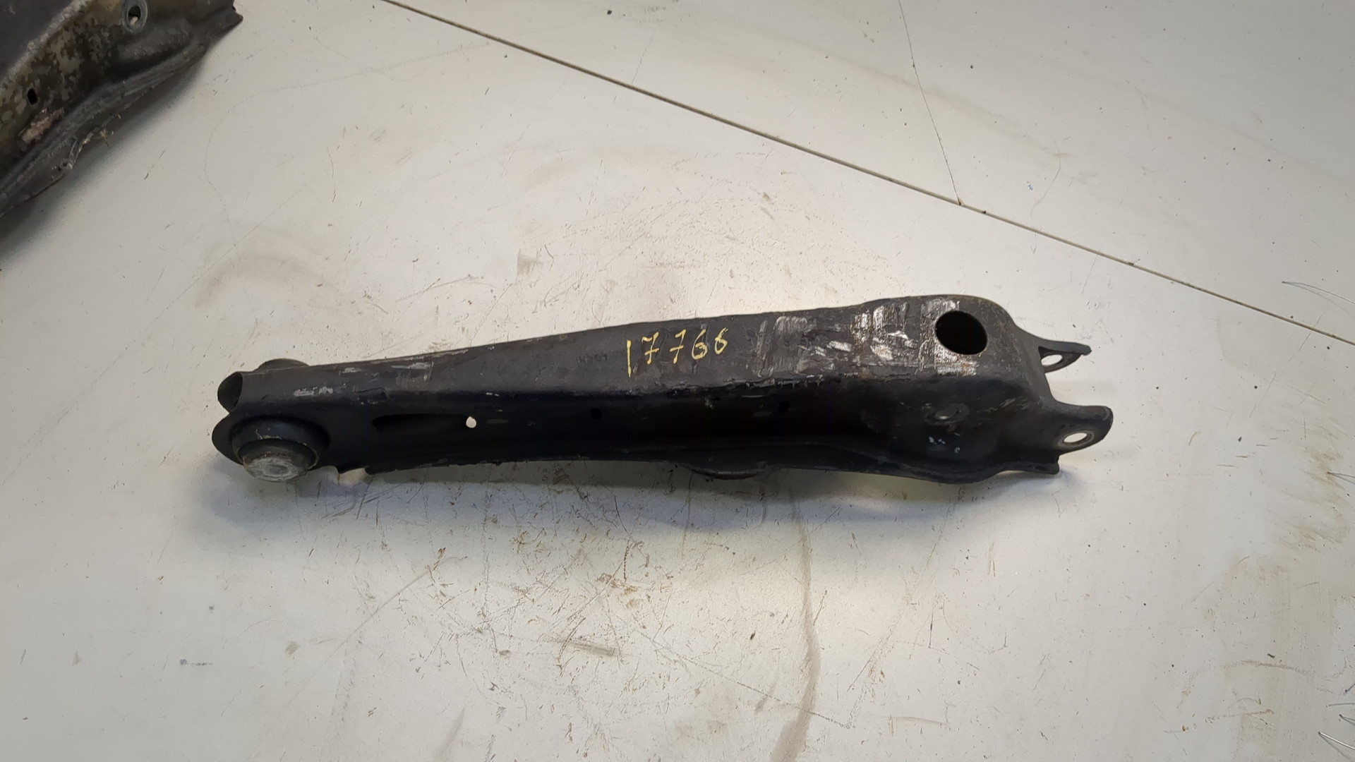 Рычаг задний