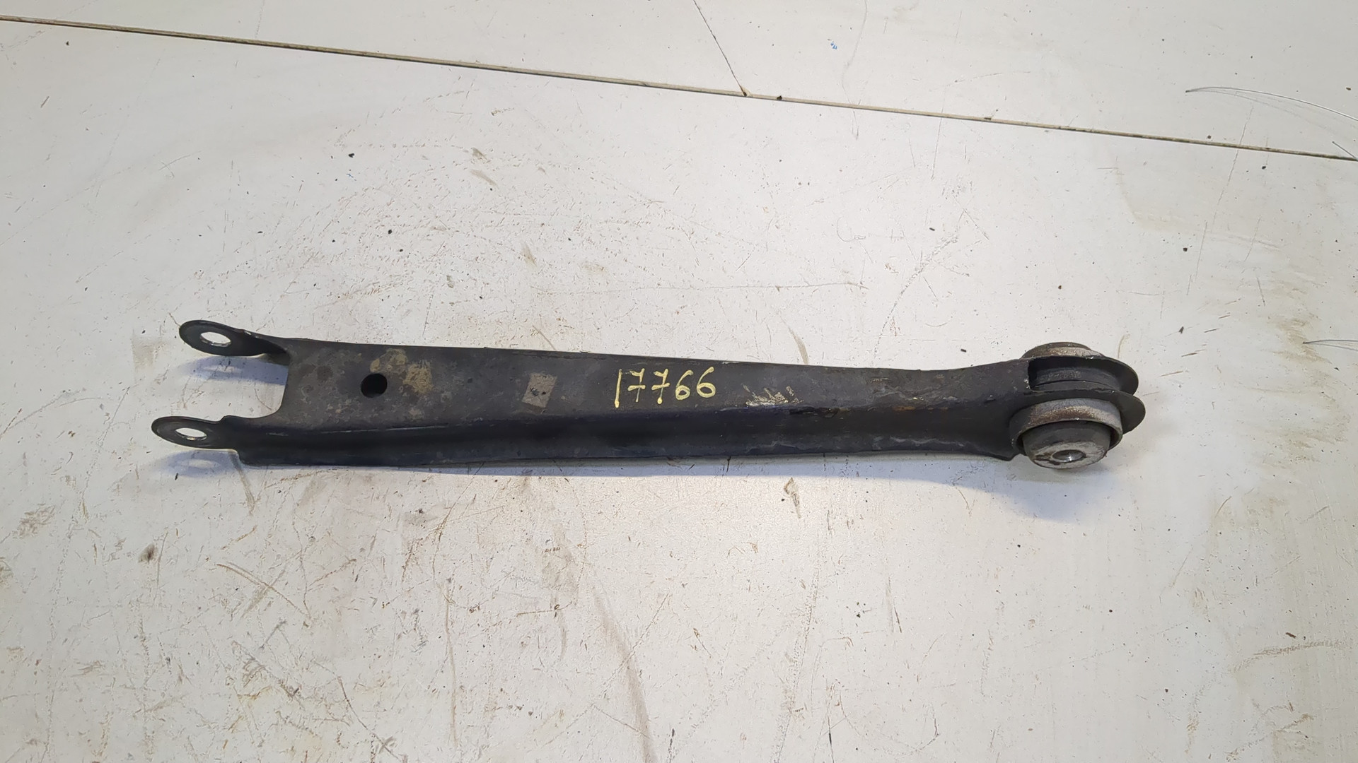 Рычаг задний