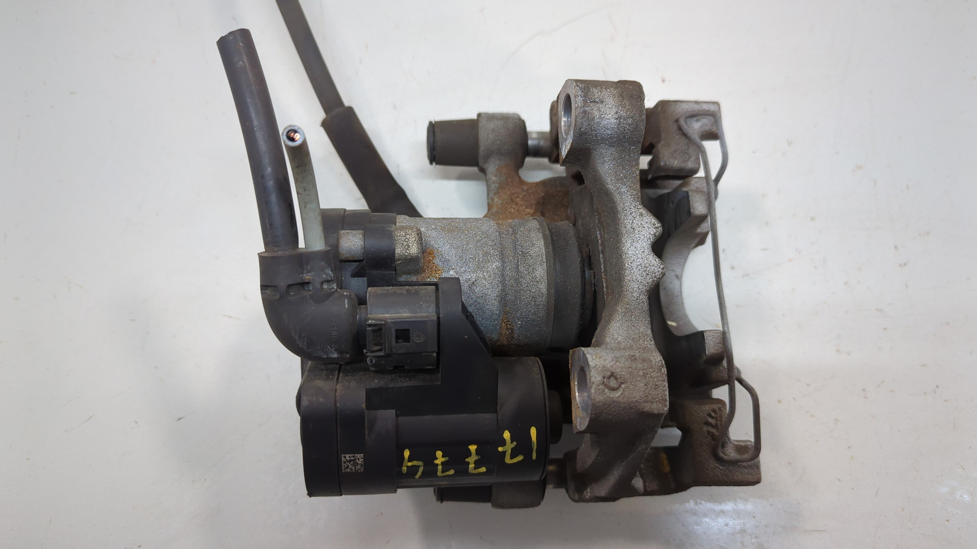 Суппорт задний левый