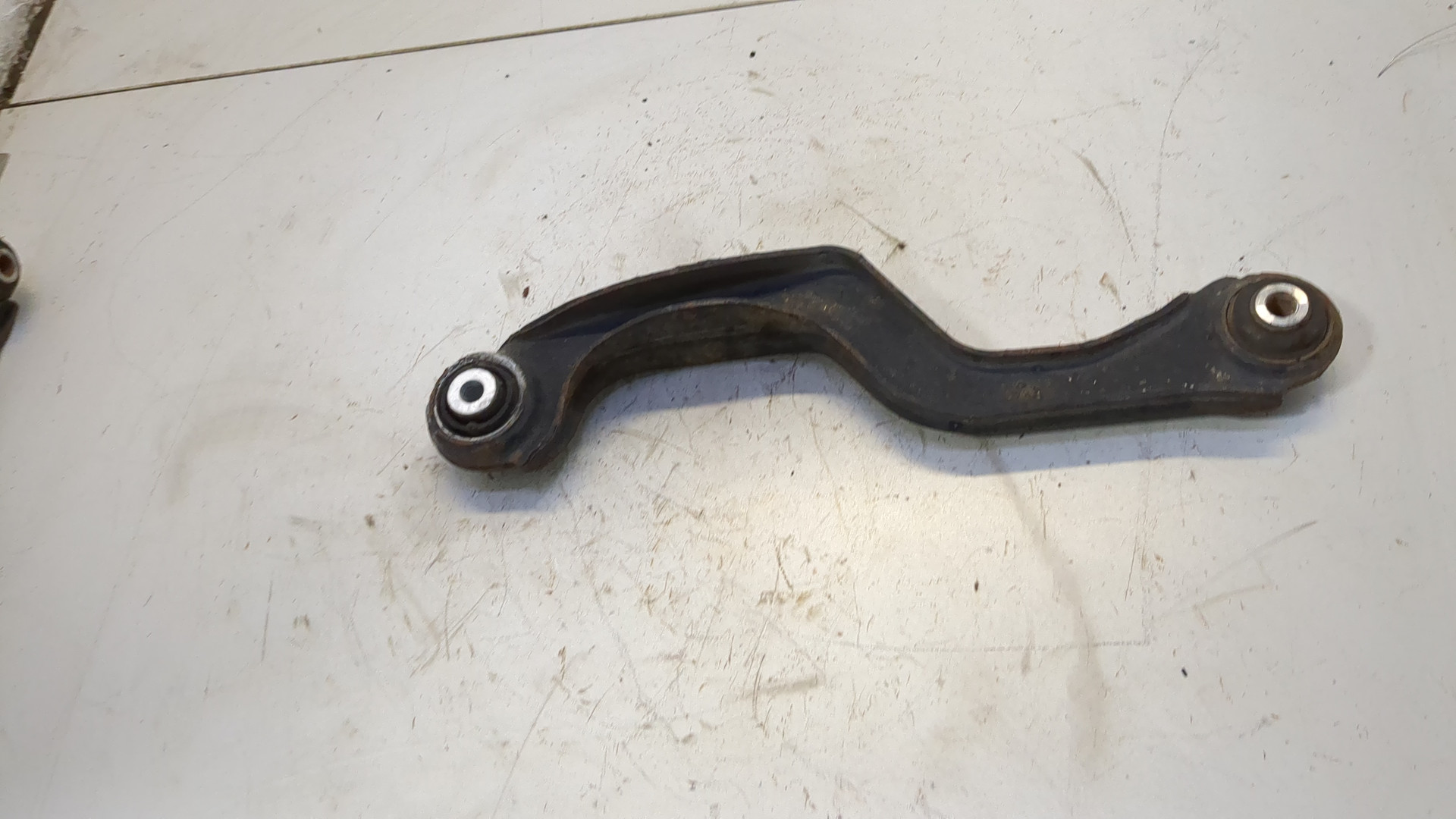 Рычаг задний