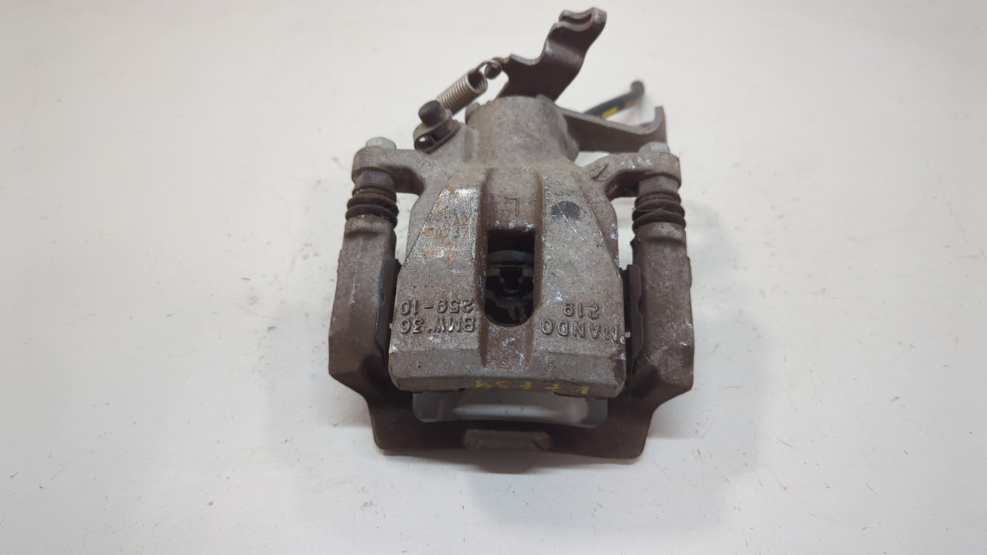 Суппорт задний левый