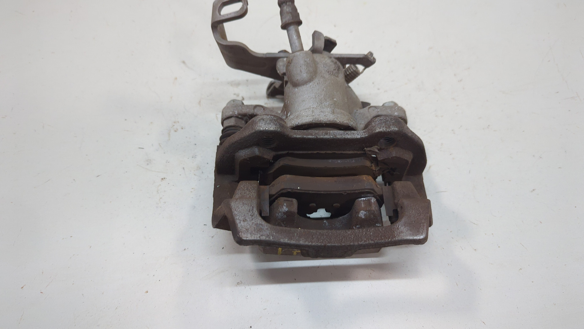 Суппорт задний левый