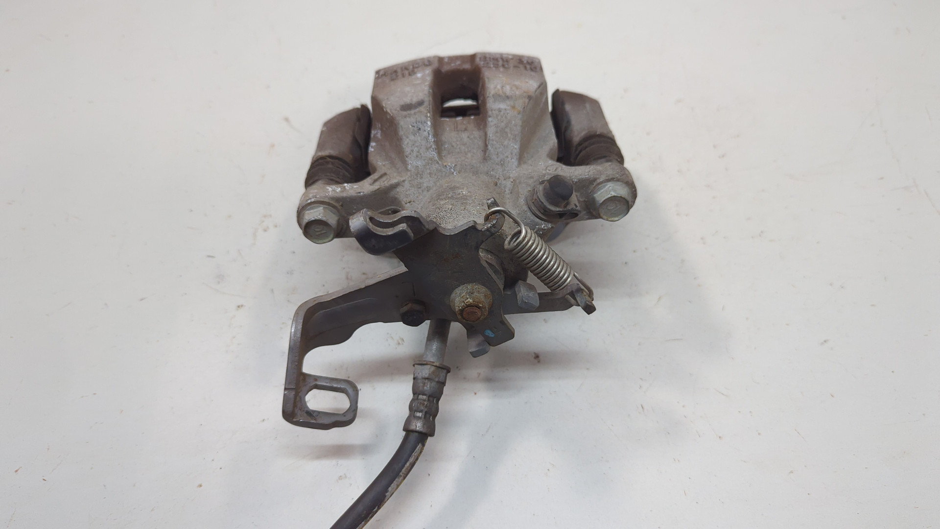 Суппорт задний левый