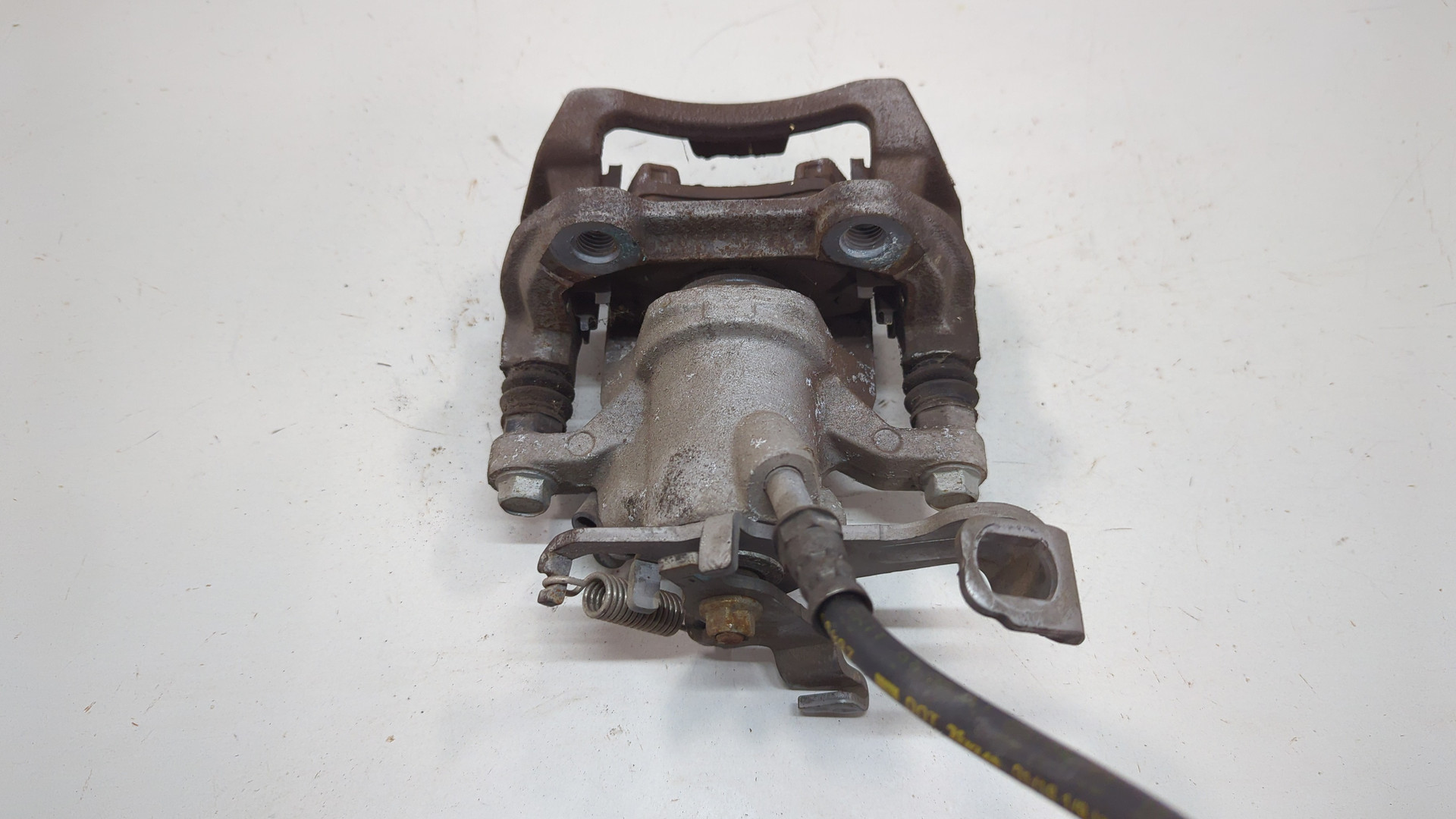 Суппорт задний левый