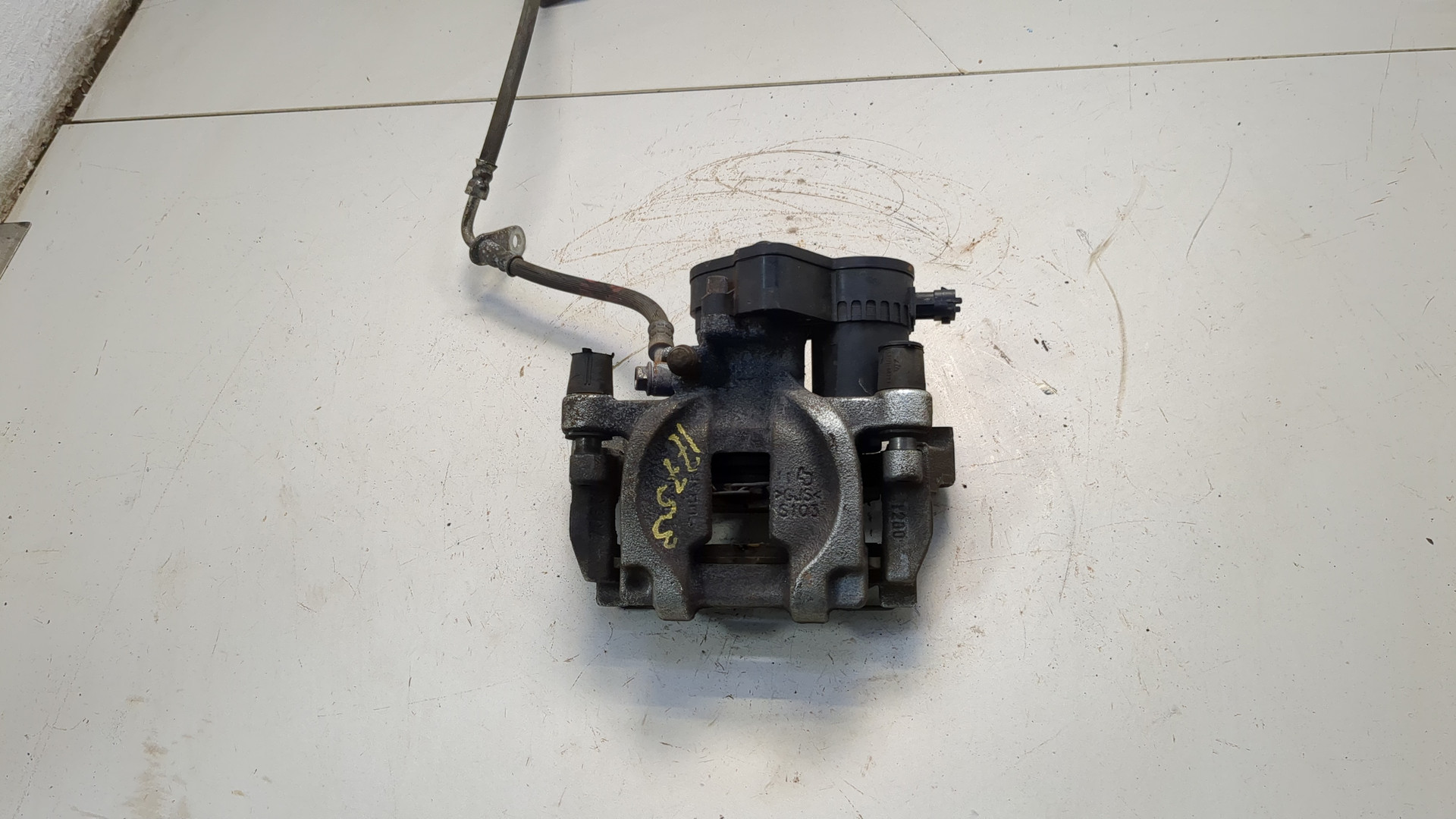 Суппорт задний левый