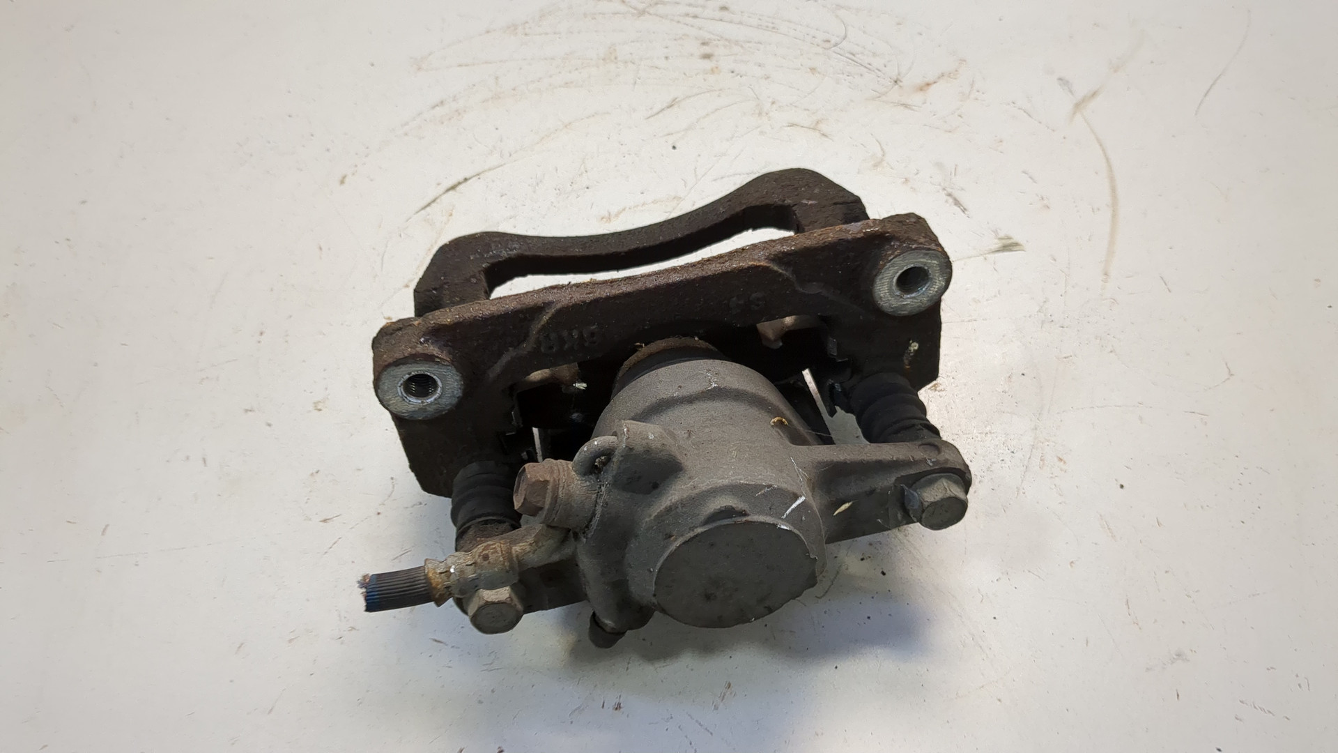 Суппорт задний левый