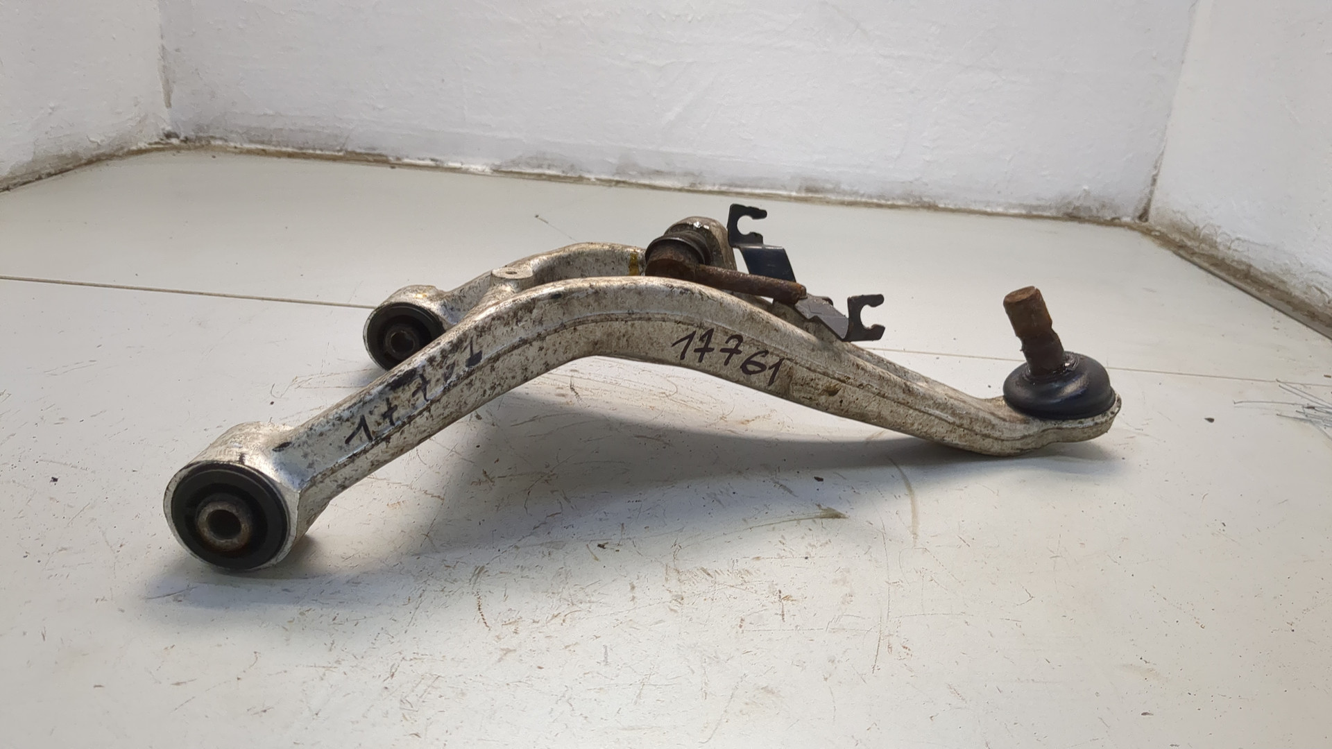 Рычаг задний левый