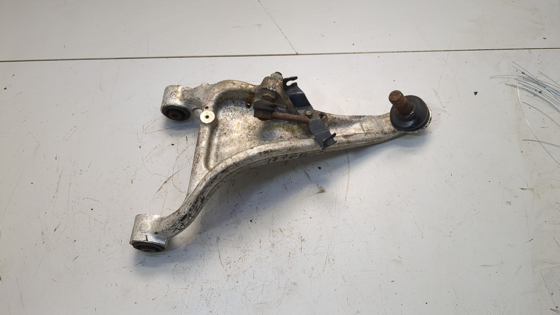 Рычаг задний левый