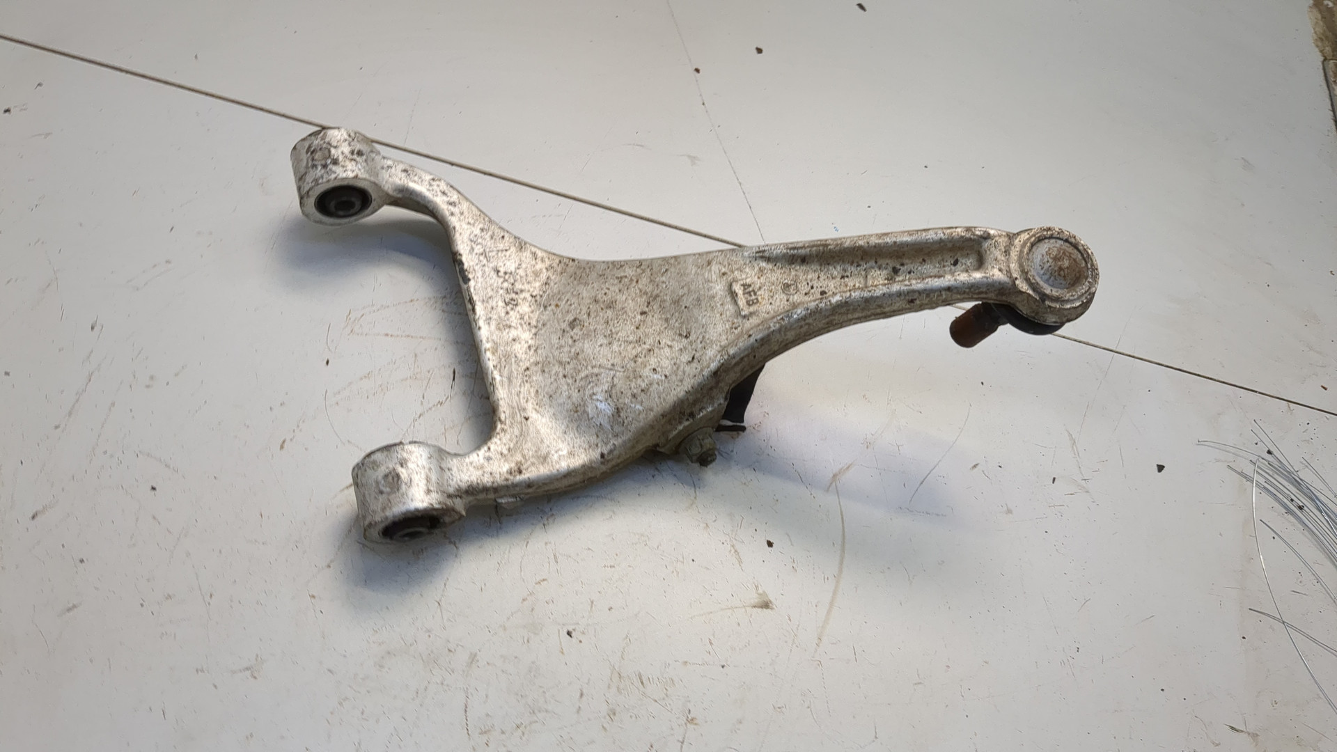 Рычаг задний левый