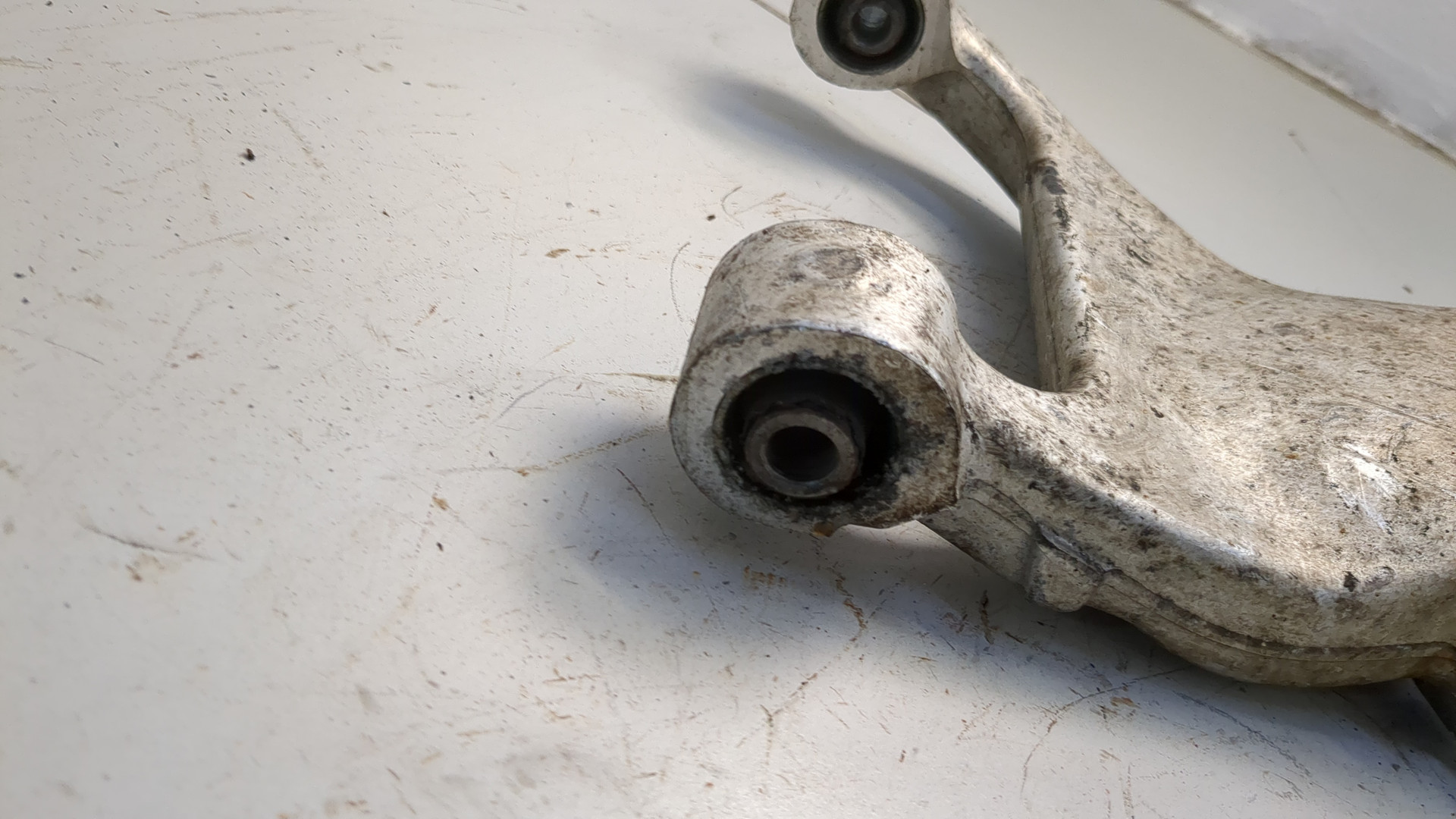 Рычаг задний левый