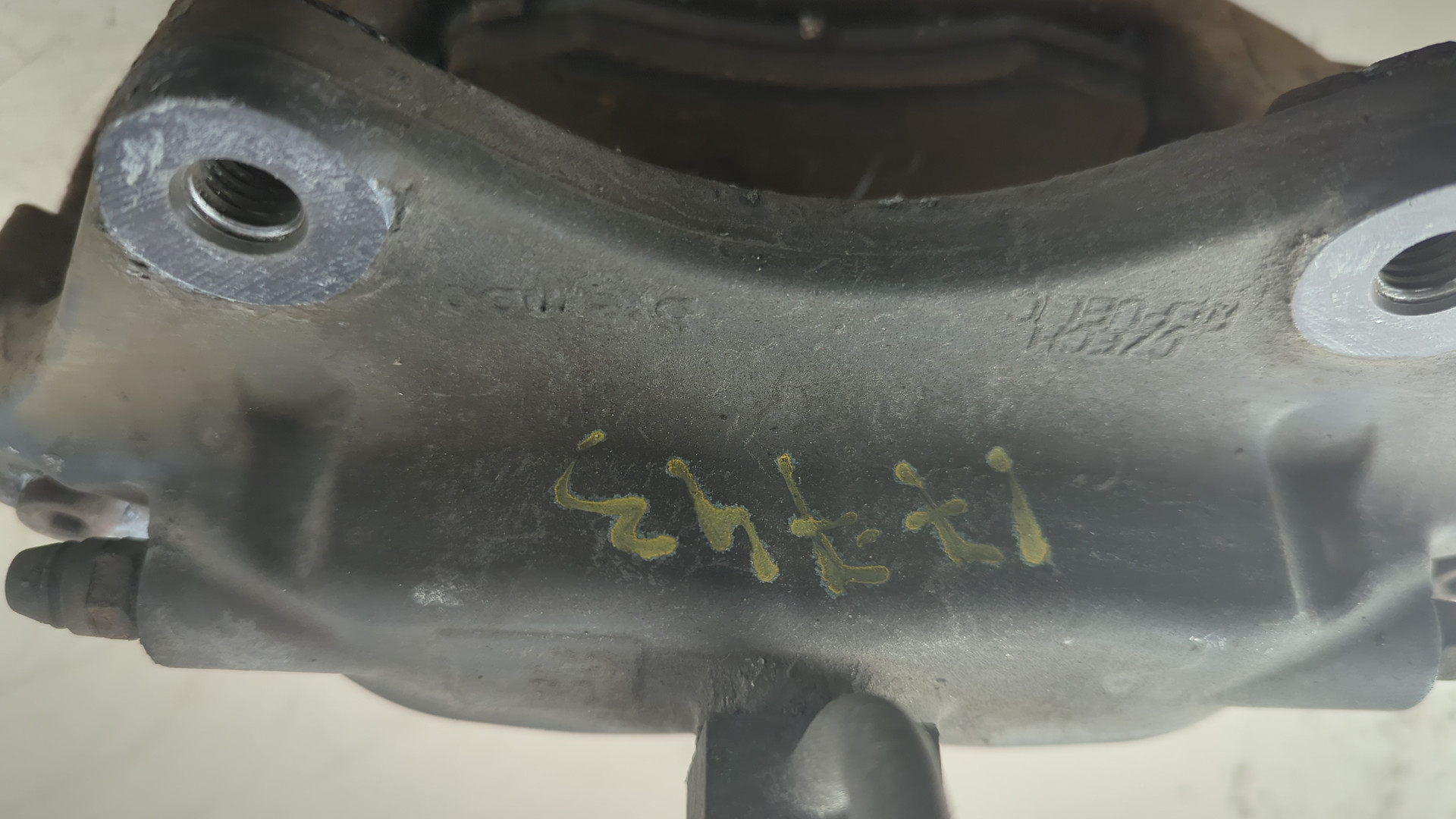 Суппорт задний левый