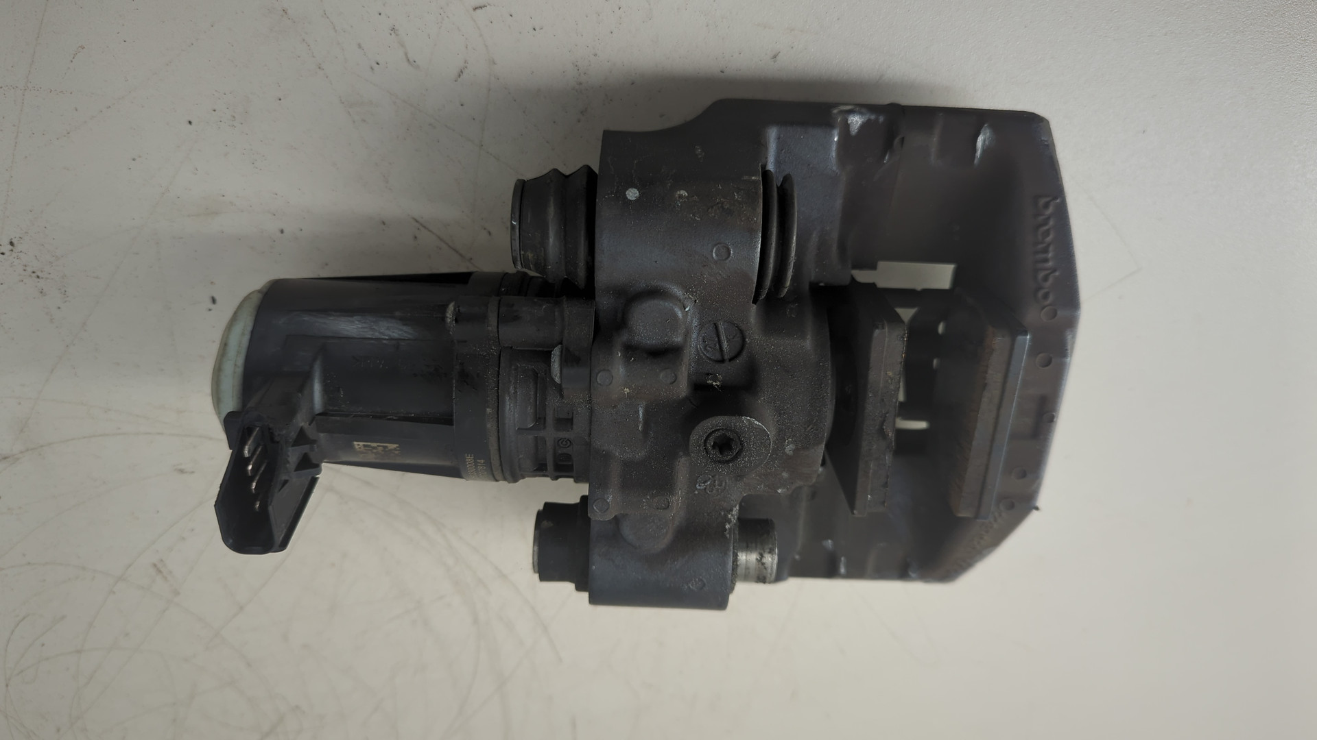 Суппорт задний левый