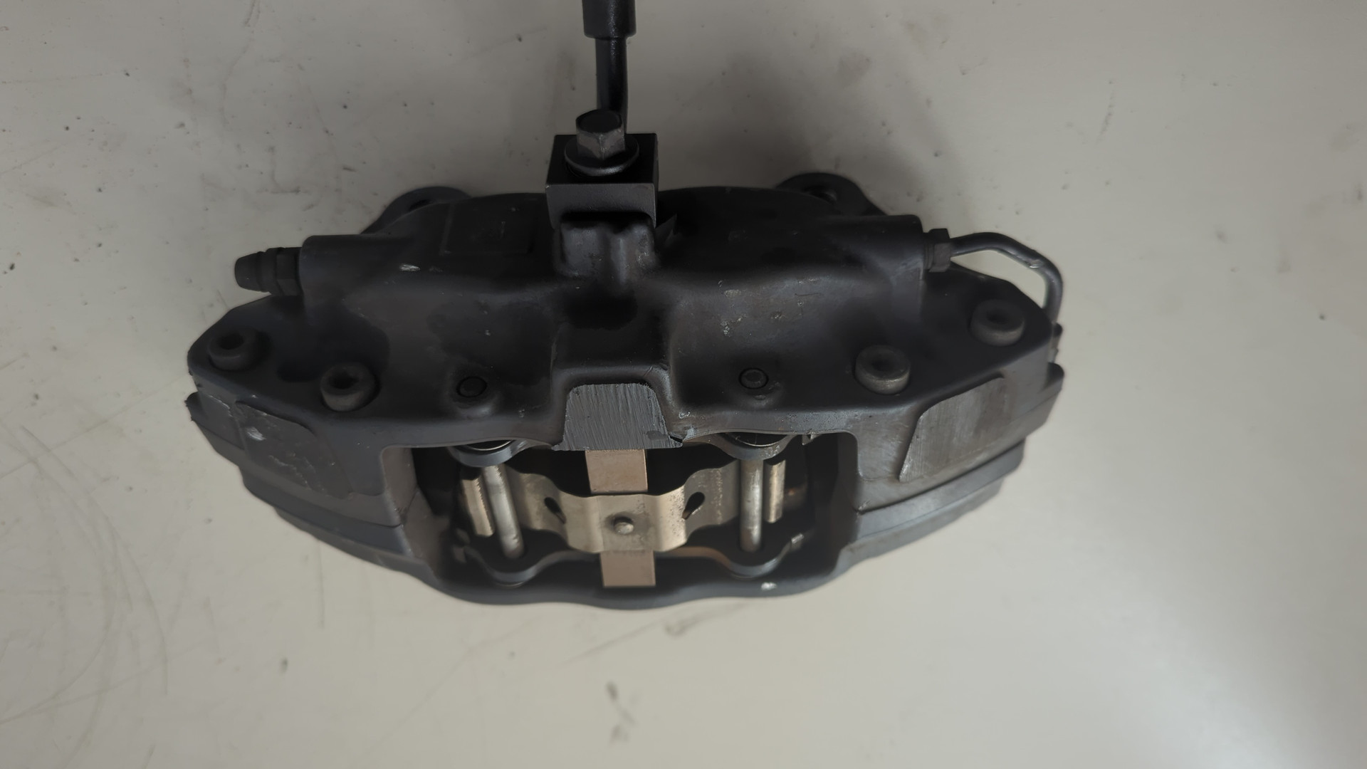 Суппорт задний левый