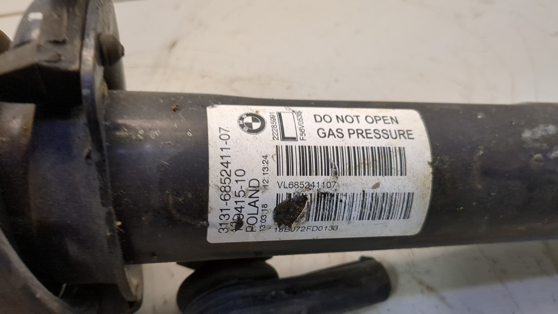 Амортизатор передний левый