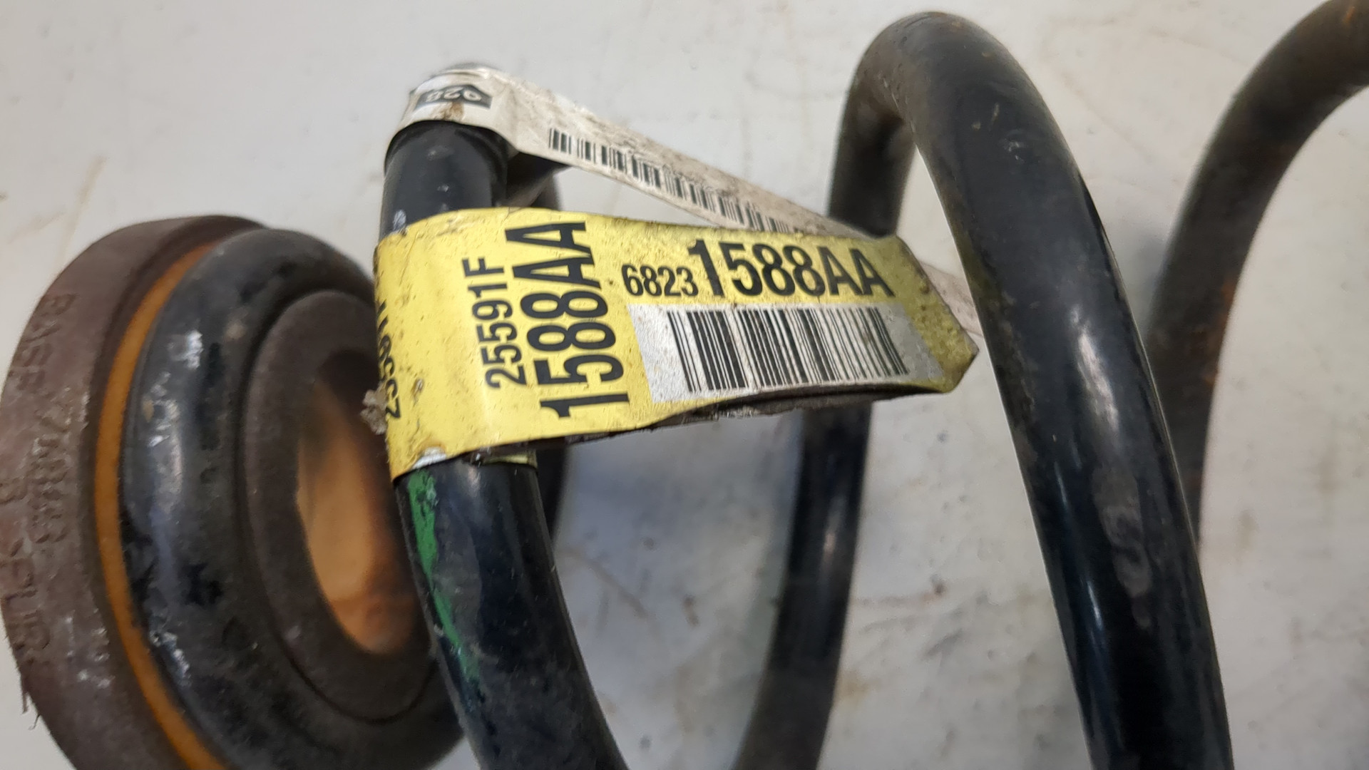 Пружина задняя