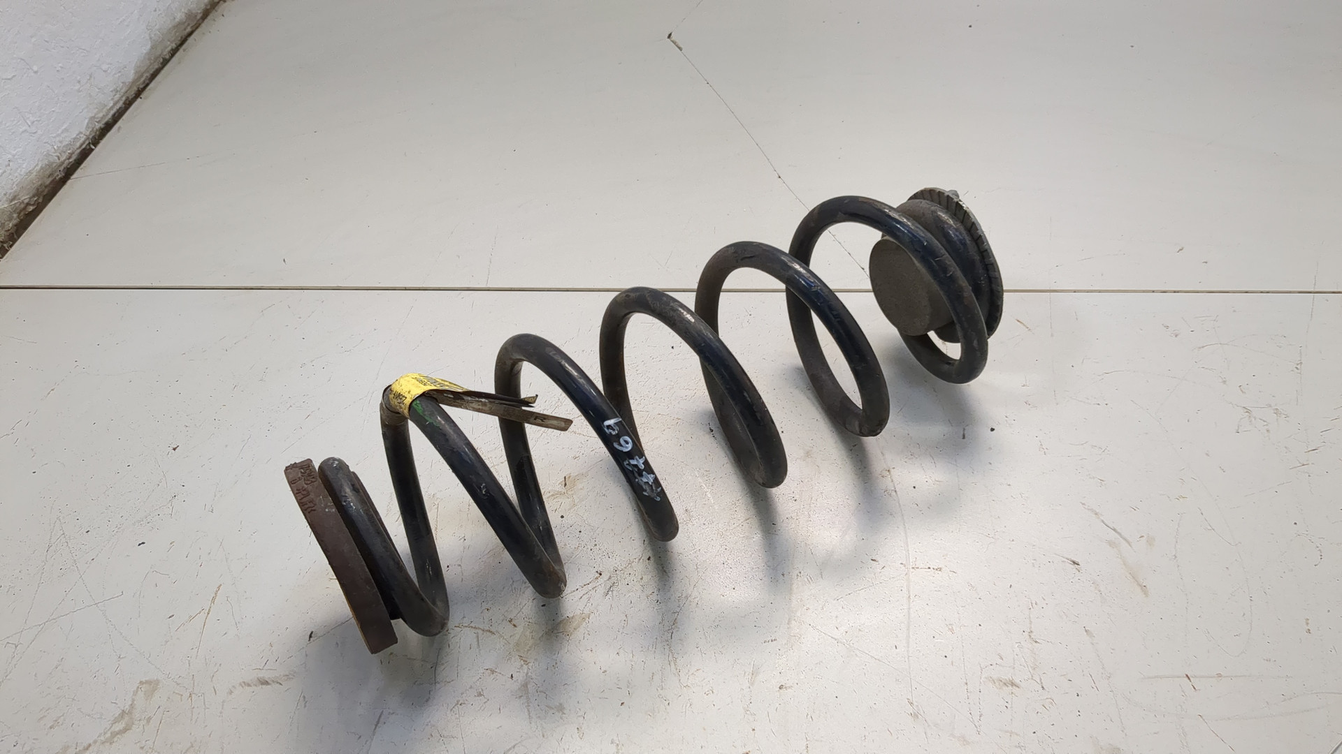 Пружина задняя