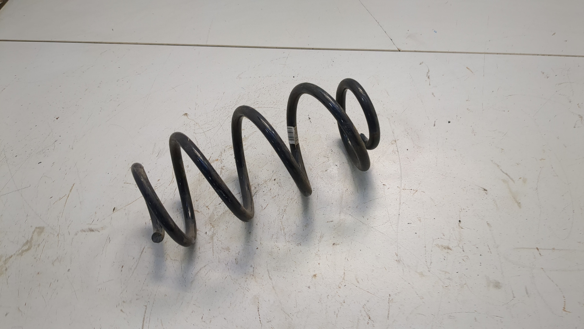 Пружина задняя