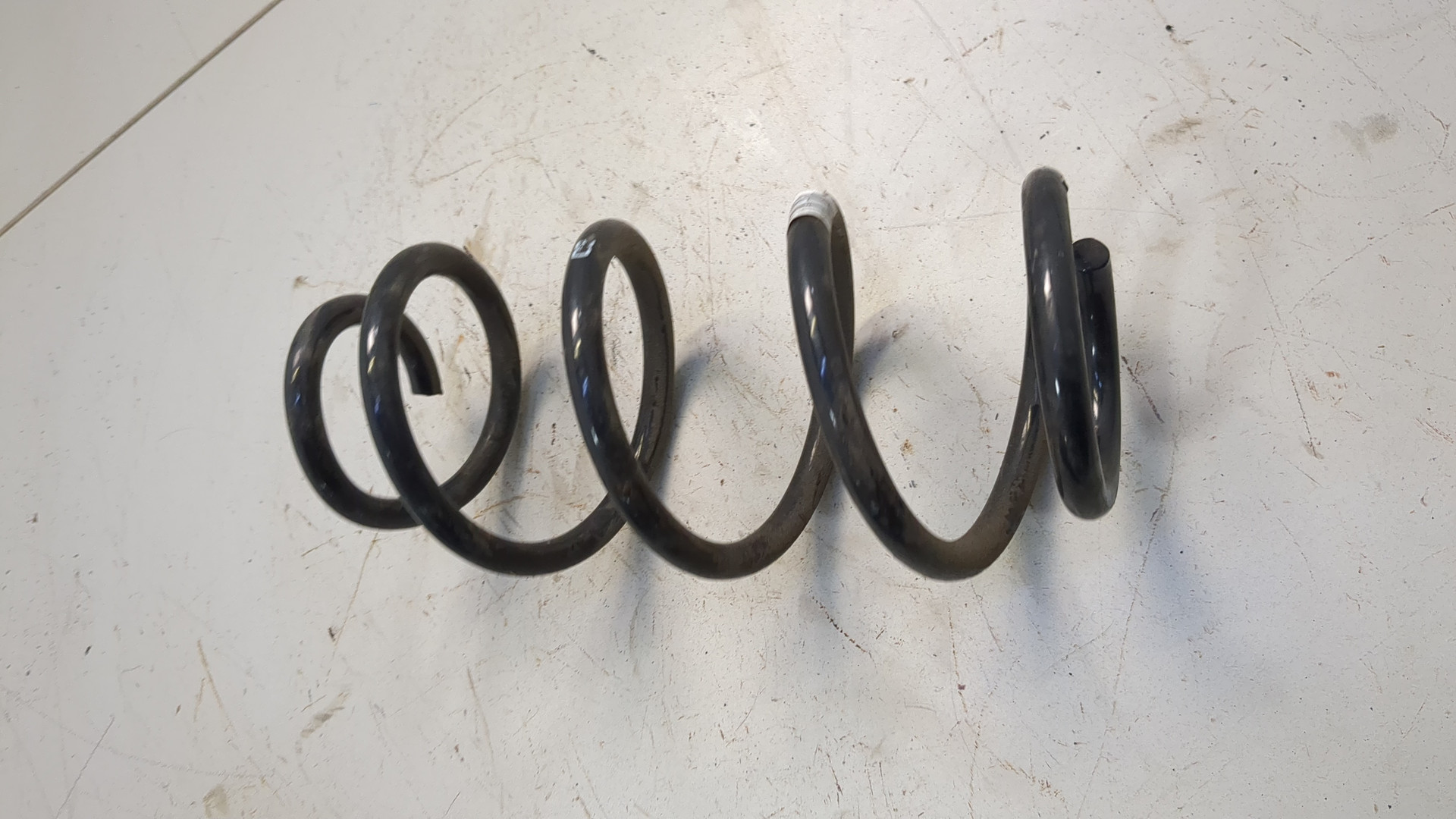 Пружина задняя