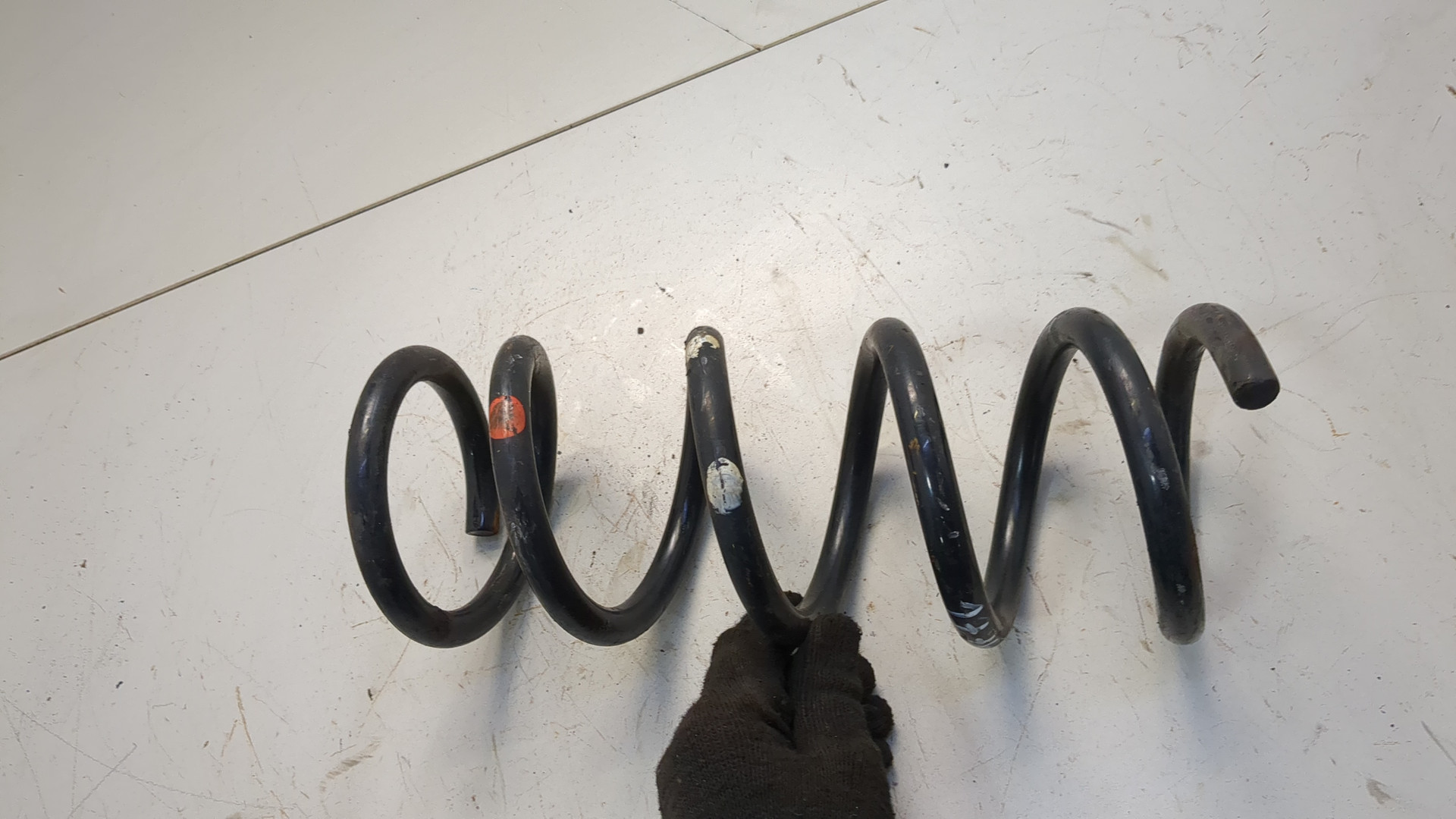 Пружина задняя