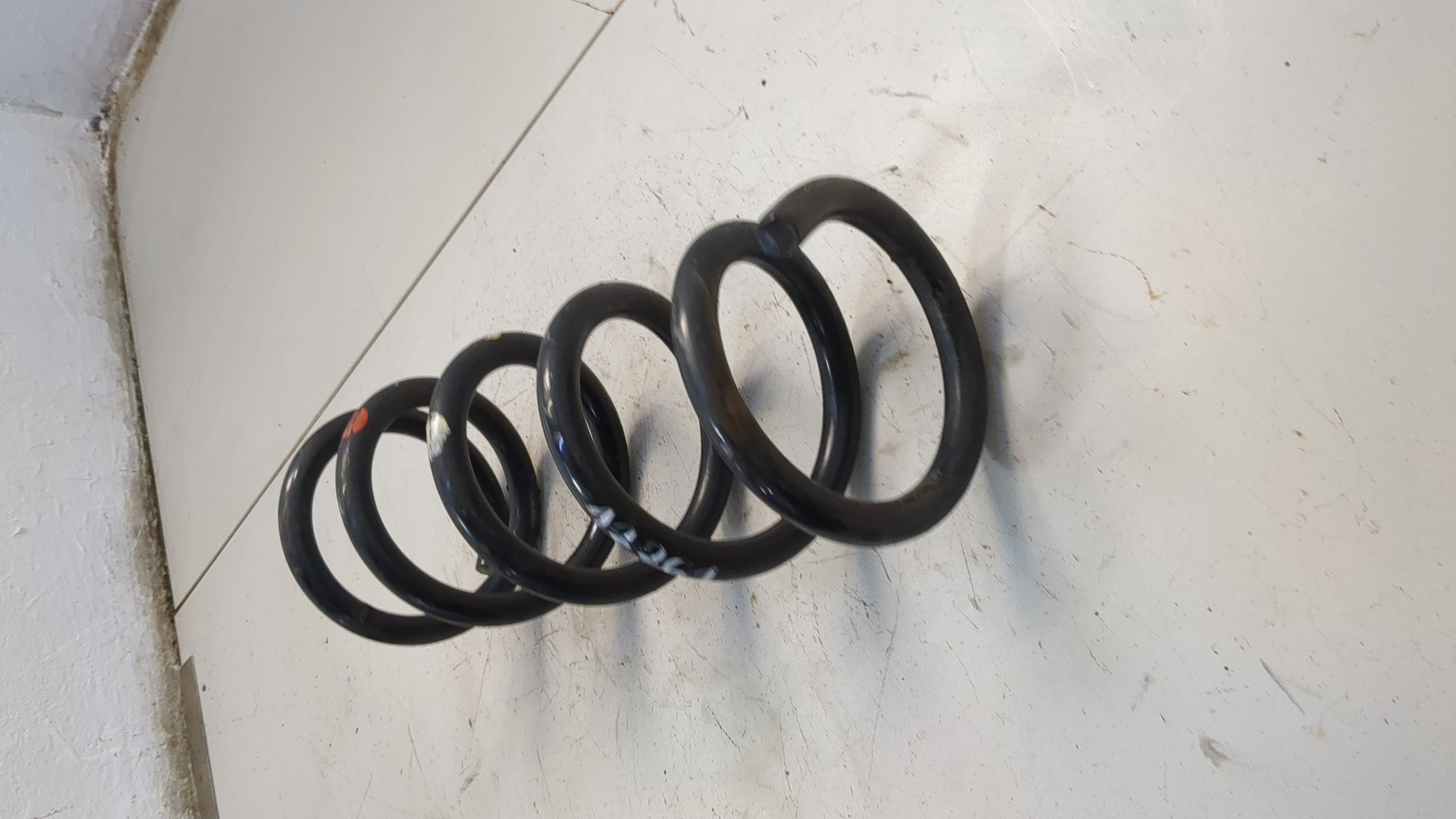 Пружина задняя