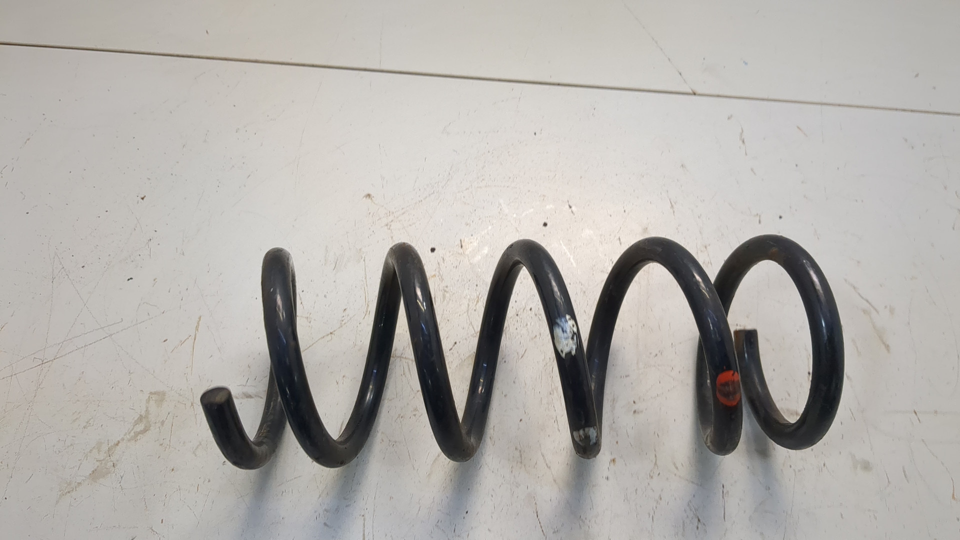 Пружина задняя