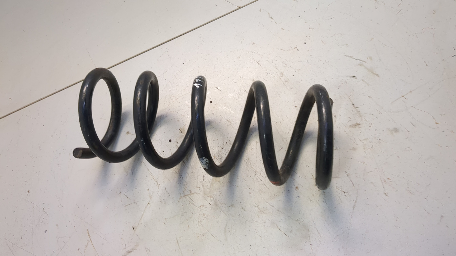 Пружина задняя