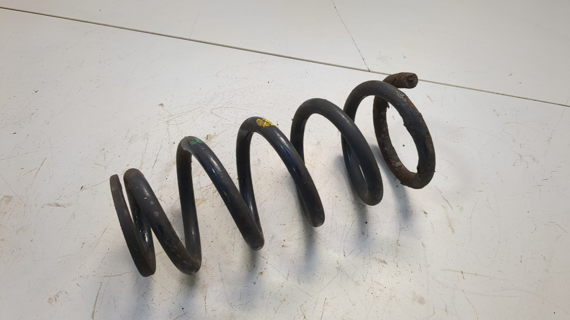 Пружина задняя