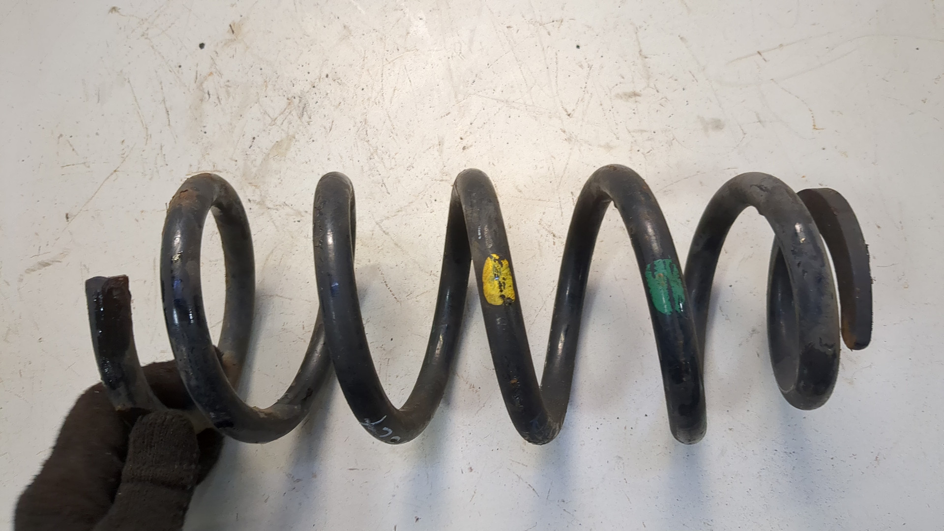 Пружина задняя