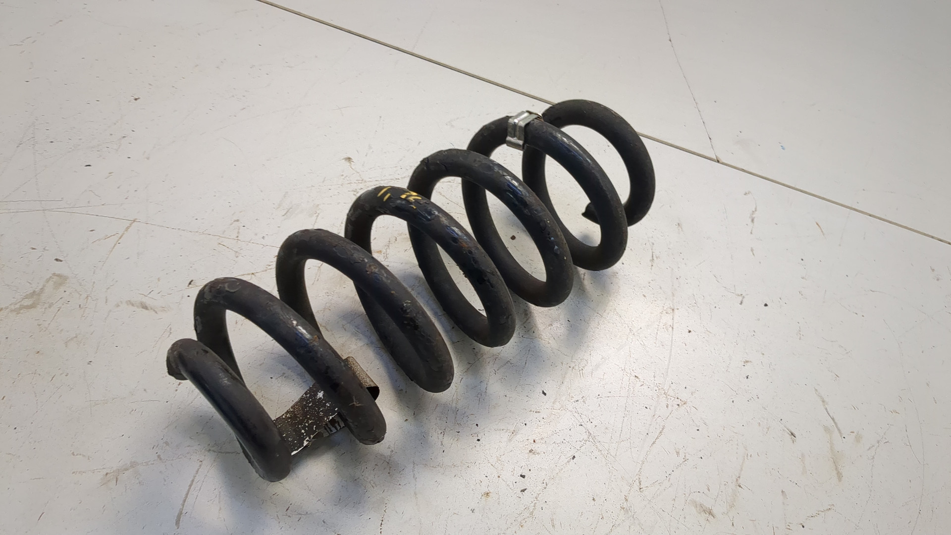 Пружина задняя